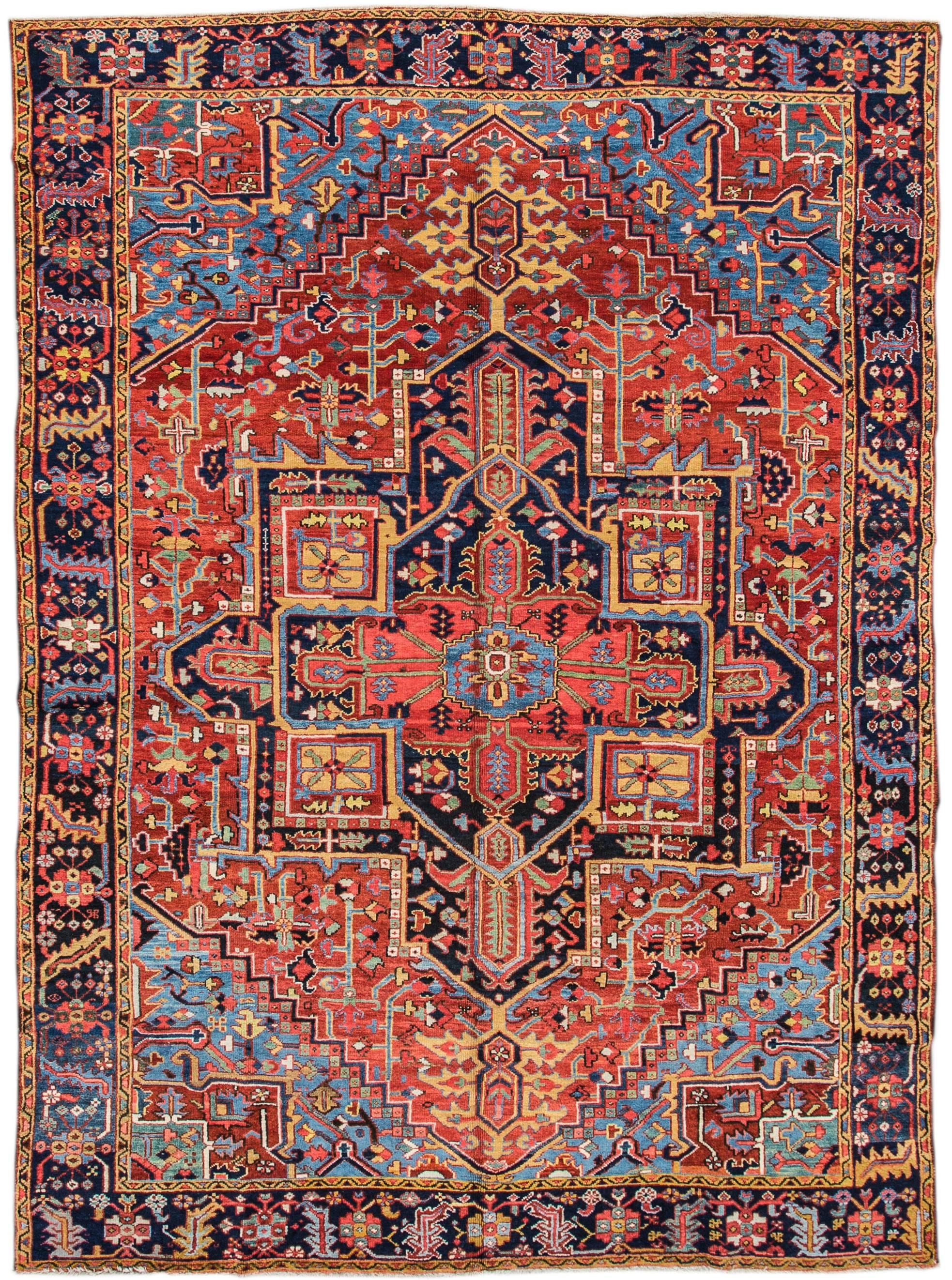 Early 20th century (1920s) Persian Heriz rug with a rust field and traditional medallion design in blue and cream. Measures 8.04x11.