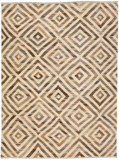 Moderner geometrischer handgefertigter Kelim-Teppich aus Wolle in Beige und Braun