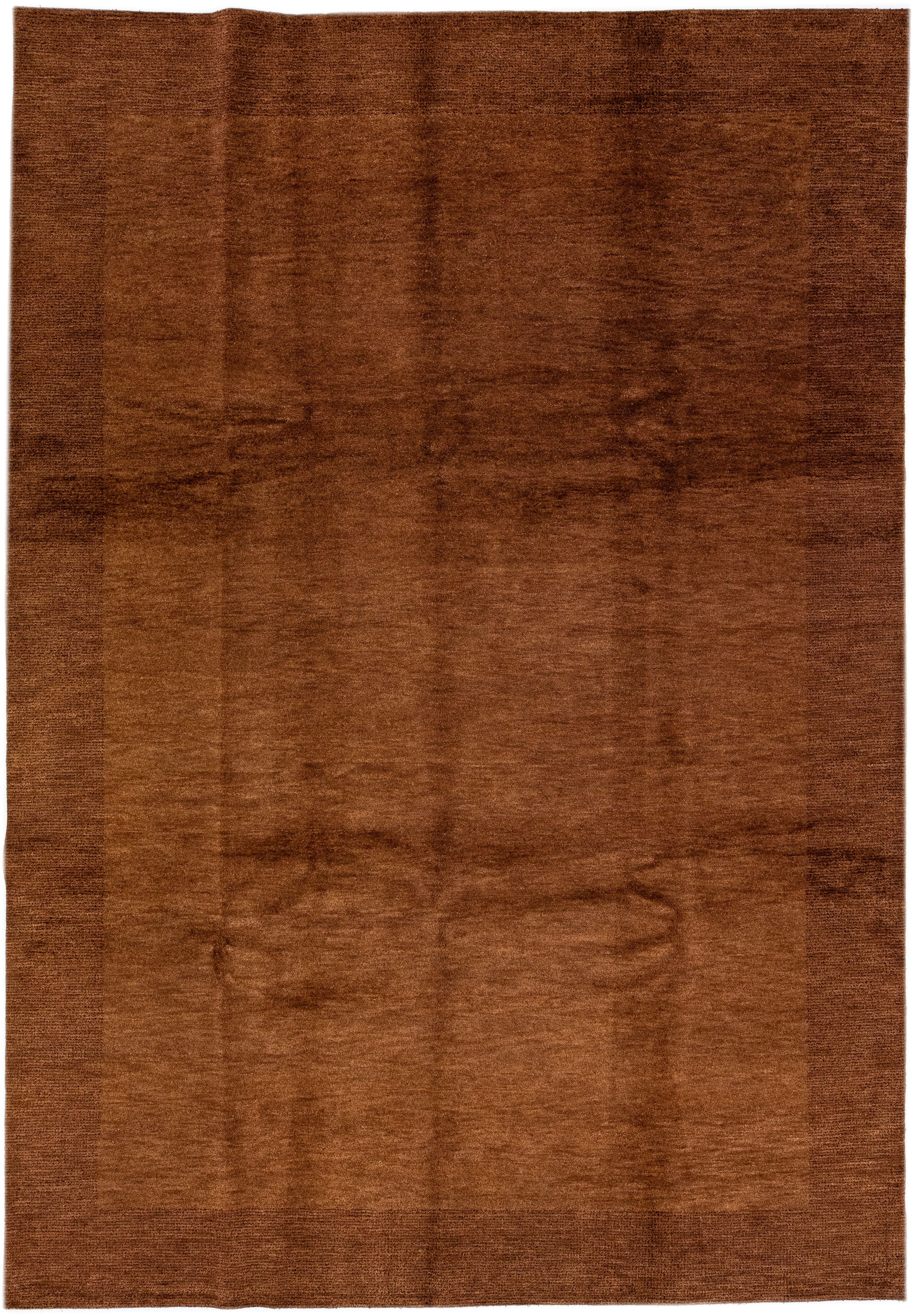 Handmade Modern Persian Gabbeh Wool Rug with Brown Solid Motif For Sale