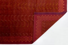 Tapis tibétain contemporain en laine et soie, dans les tons cramoisi et or, avec une bordure Art déco