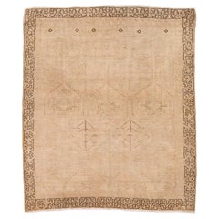 Vintage Hand-Knotted Minimalist Beige Wool Rug with Geometric Tribal Motif