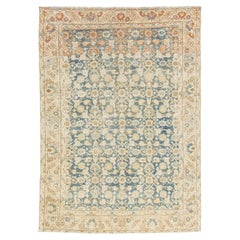 Antique Hand-Knotted Wool Rug in Faded Indigo, Soft Terracotta, and Cream