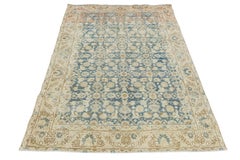 Antique Hand-Knotted Wool Rug in Faded Indigo, Soft Terracotta, and Cream