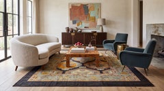 Tappeto in lana in stile vintage revival con motivi tribali esagonali nei toni del terracotta e del salvia