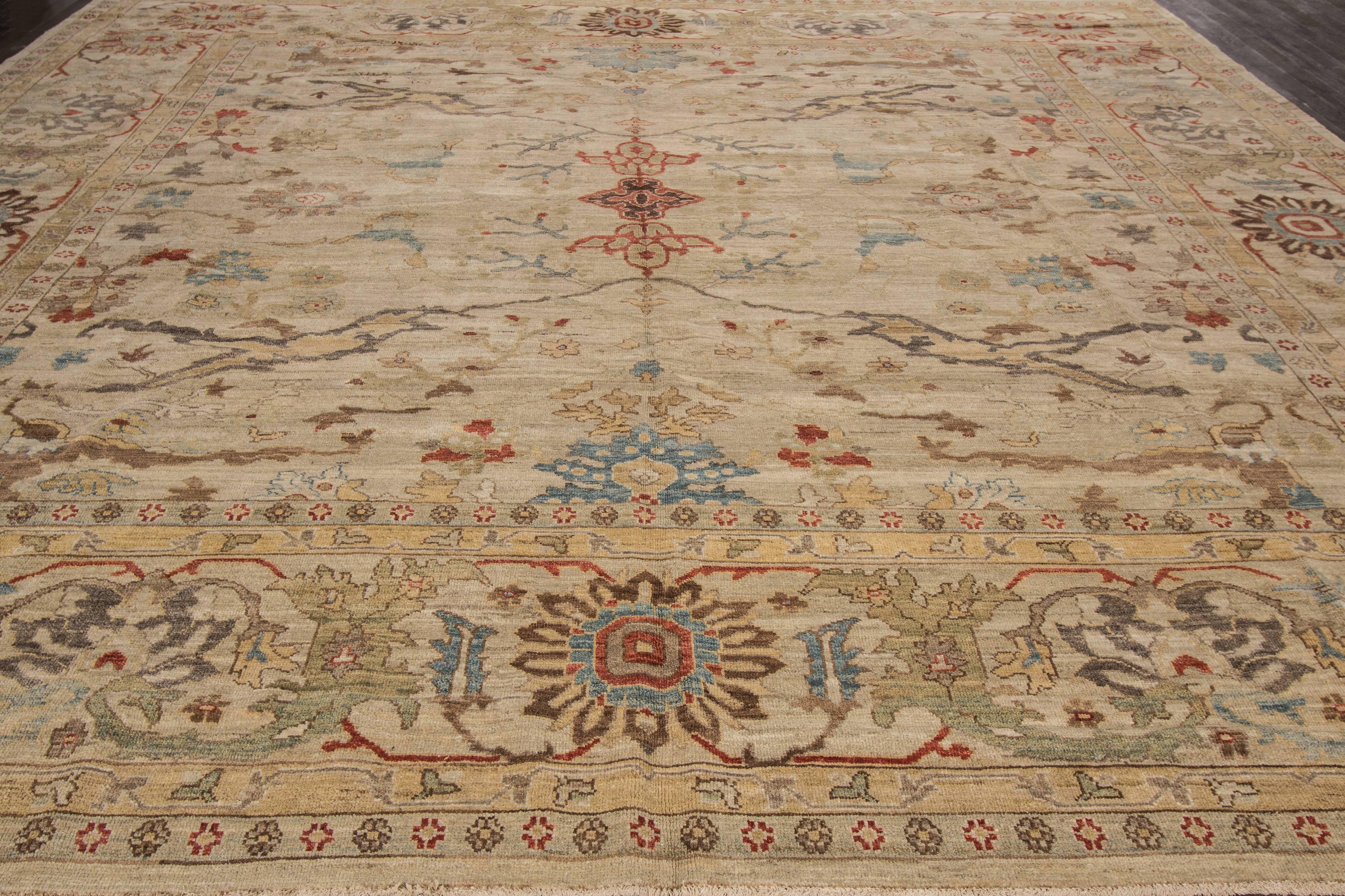 Hand-knotted Sultanabad with a floral design on a beige field with colorful accents. Excellent condition.
Material: wool. Measures: 14'2