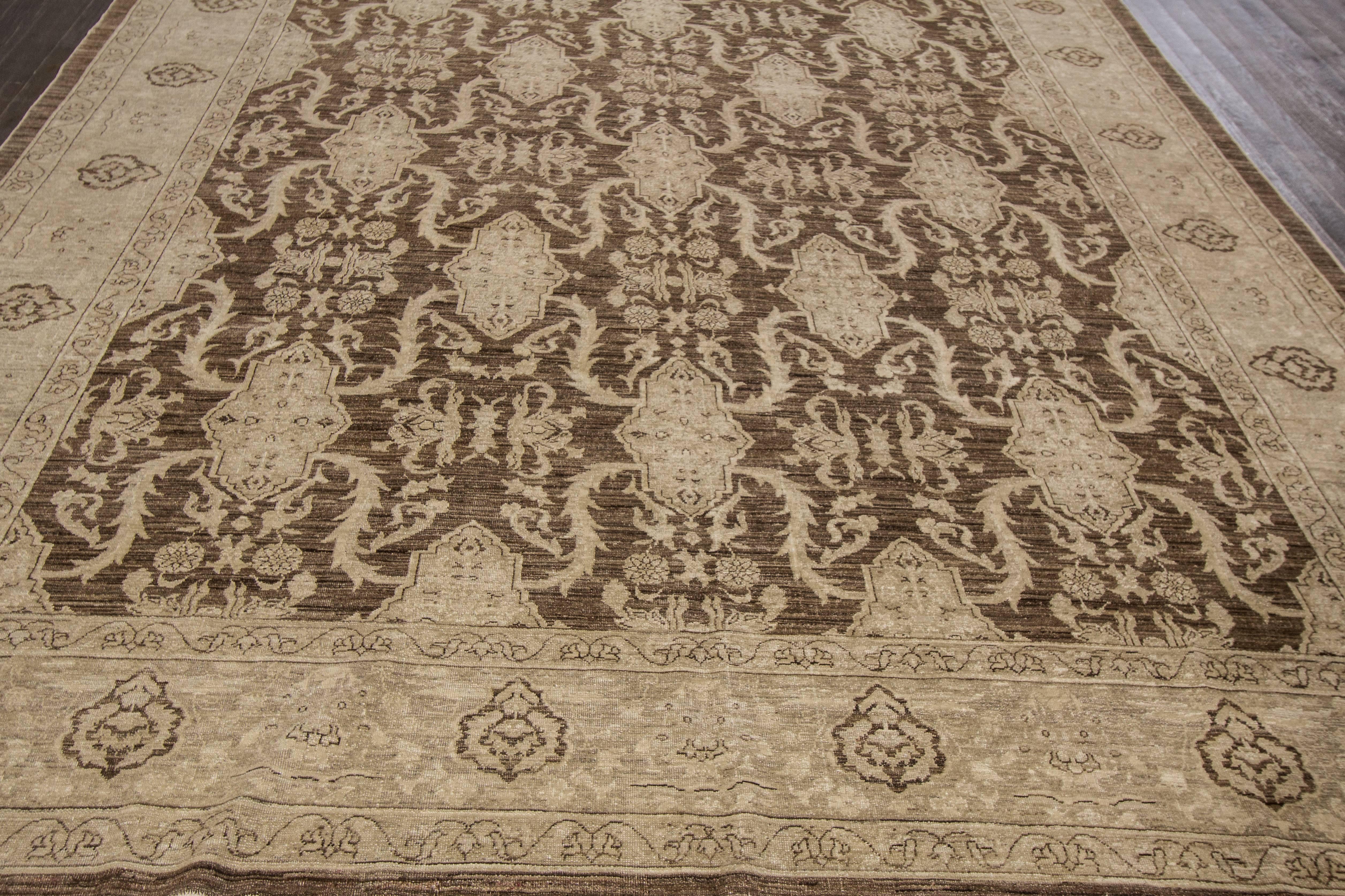 21st century contemporary (2000) Persian Peshawar rug with a dark brown field and lighter beige/tan pattern throughout. Measures 8.08x10.11.