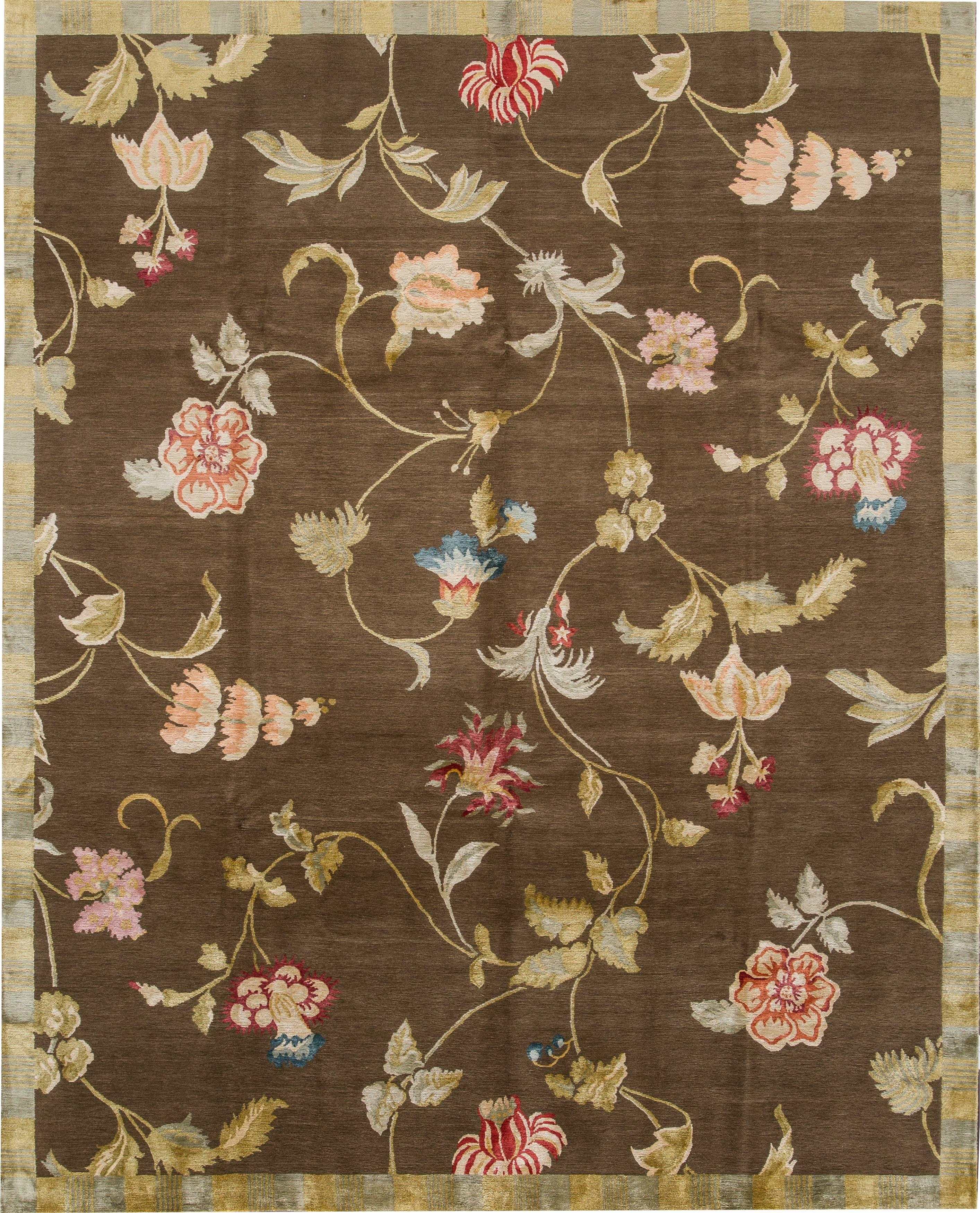21st century contemporary (2000) Nepalese Lapchi rug, blend of wool and silk. Has a dark brown field and multicolored floral design. Measures 8x10.

