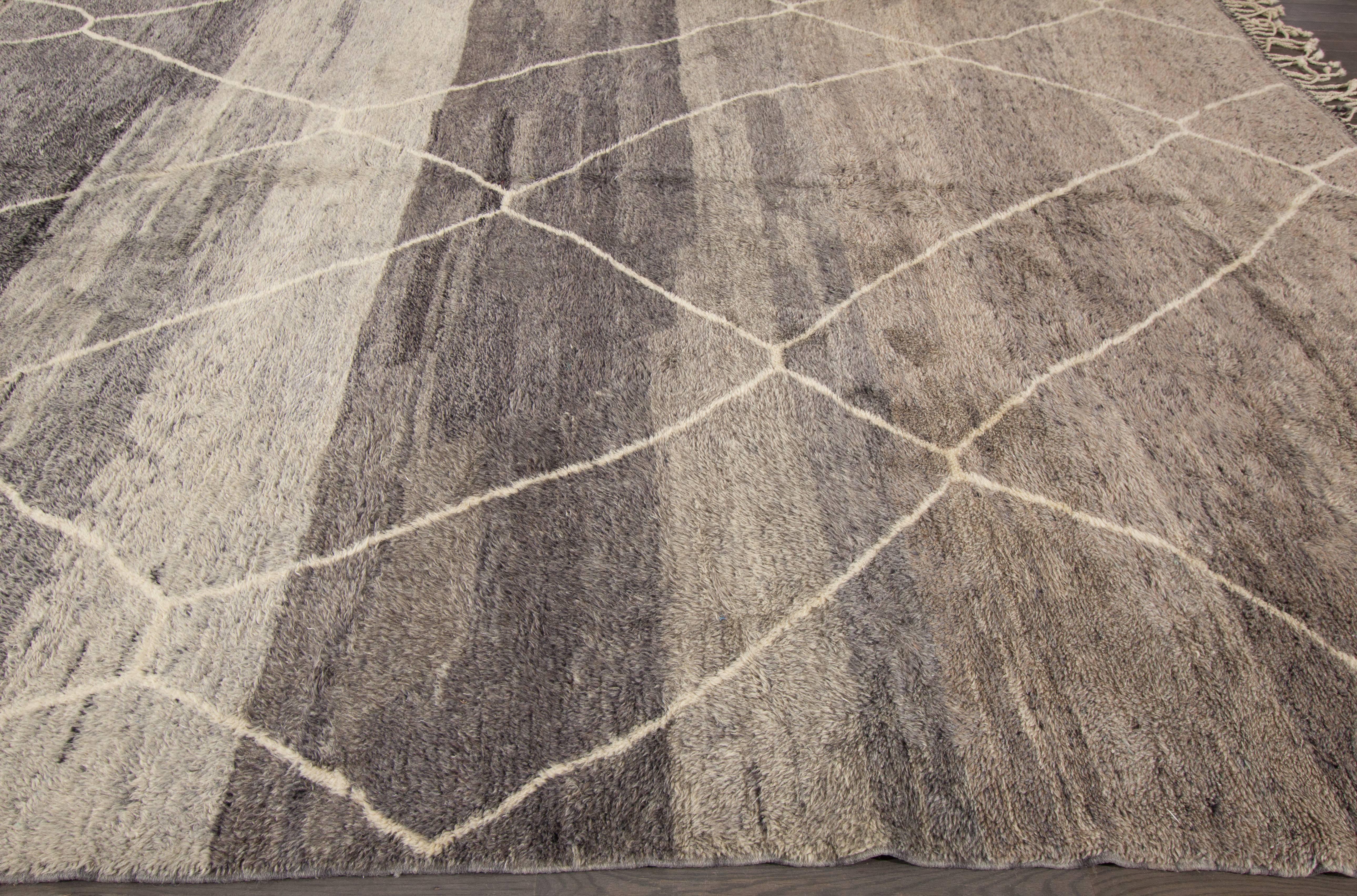 21st century contemporary (2000) square Moroccan carpet with a silvery-gray field and abstract design in thin cream/beige intersecting lines. Measures 11.09x12.07.