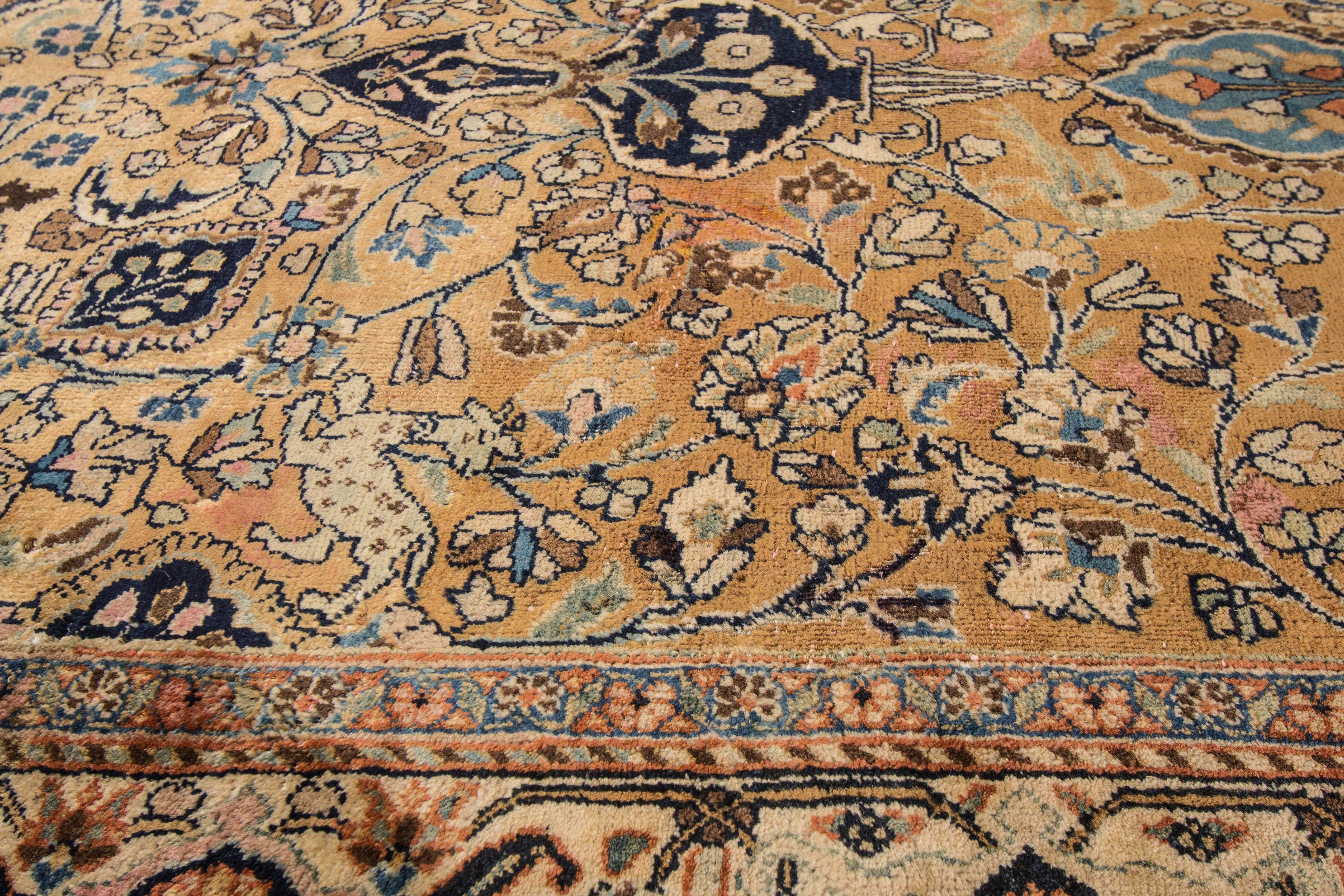Early 20th Century Vintage Woven Persian Mashad Rug For Sale