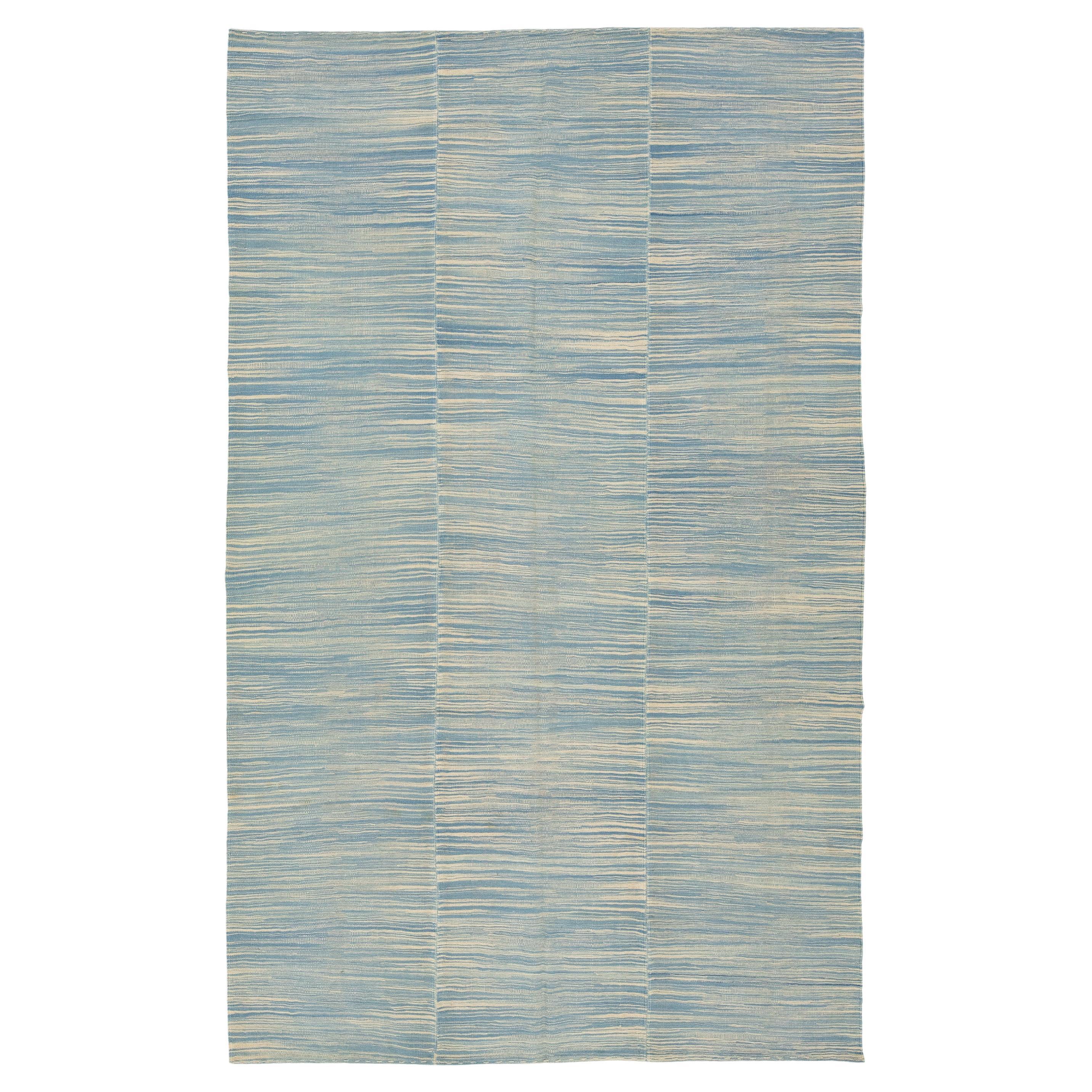 Rug & Kilim Contemporary bleu/beige en laine tissée à plat