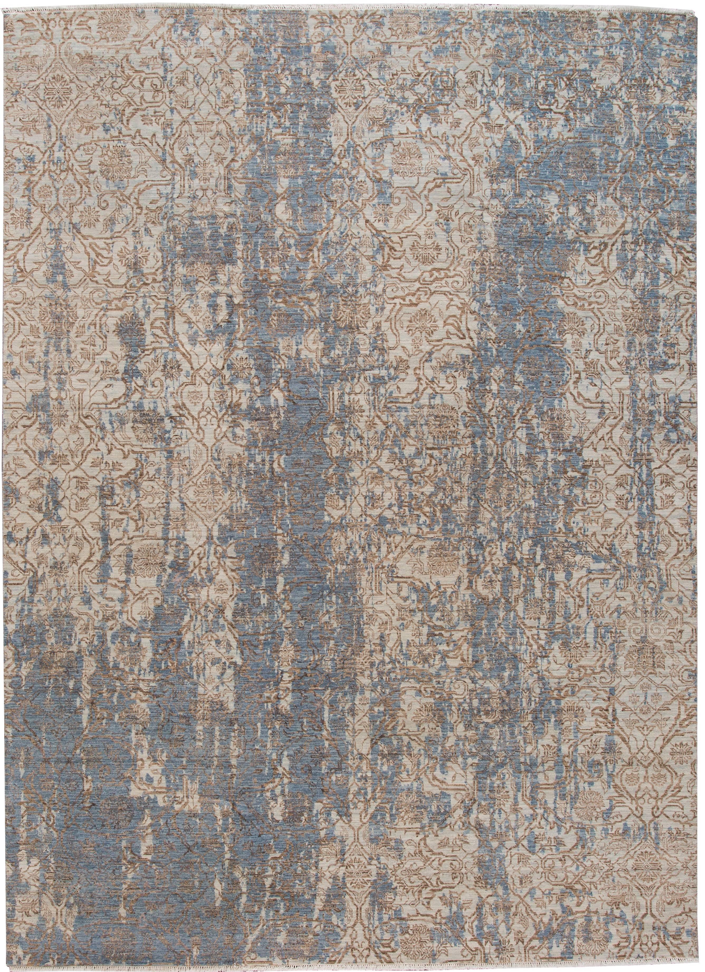 A hand-knotted contemporary Tibetan rug with a floral design on a blue field. Accents of brown and beige throughout the piece. This rug measures 9'.1 x 12'.4.