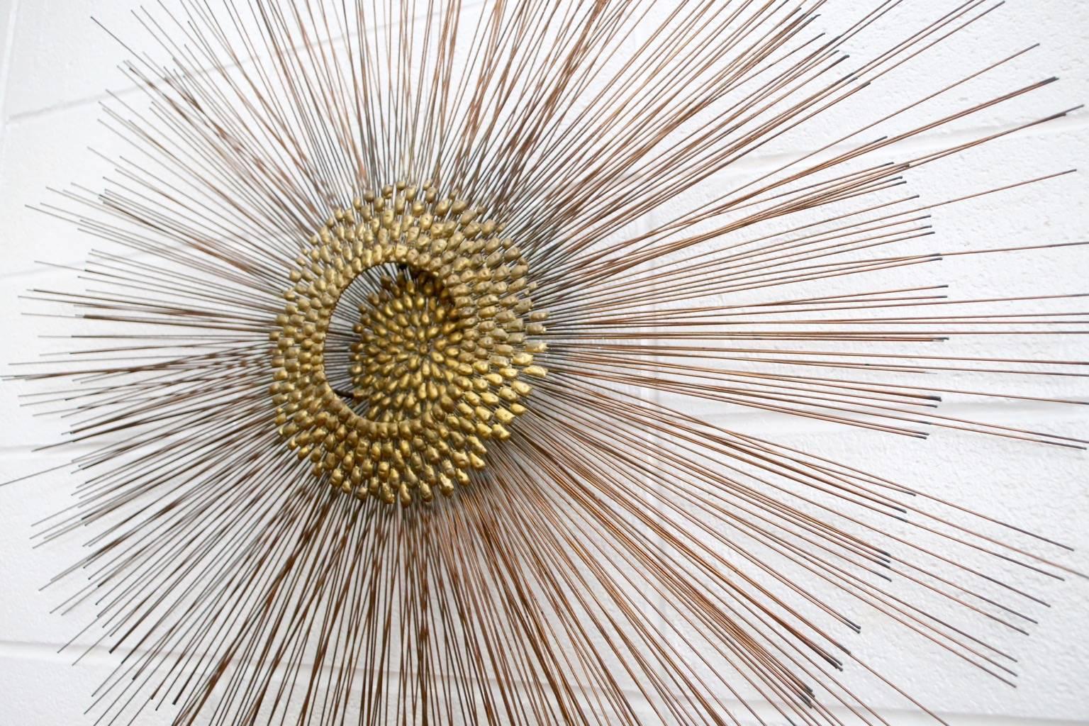 Mid-Century Brutalist copper sunburst starburst wall sculpture by William Friedle. In the style of C. Jere.