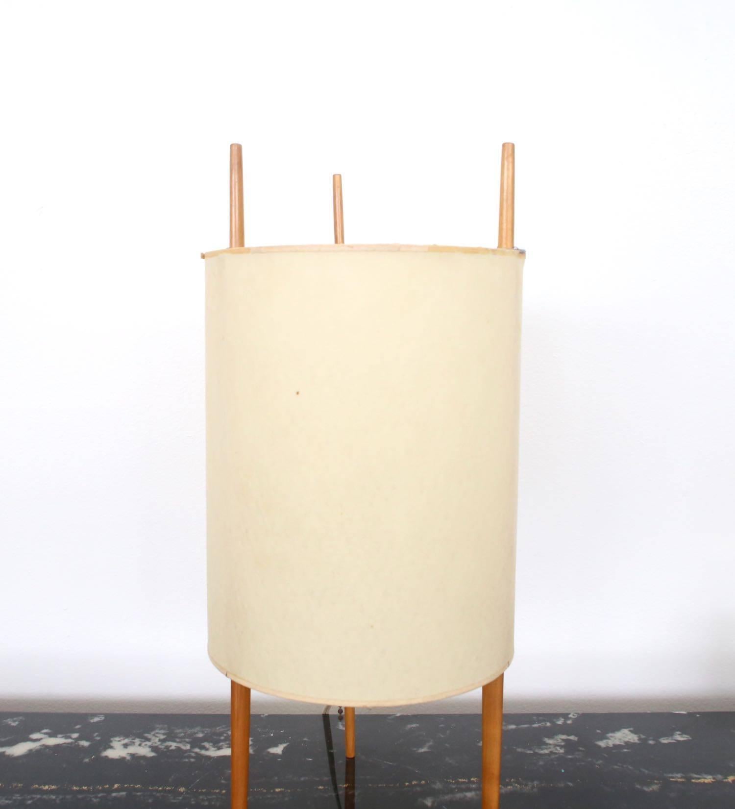 Pair of Isamu Noguchi designed model 9 table lamps produced by Knoll & Associates in 1947. Original fiberglass shade. No restoration has been done. Shade is starting to separate from wire frame, but still intact.