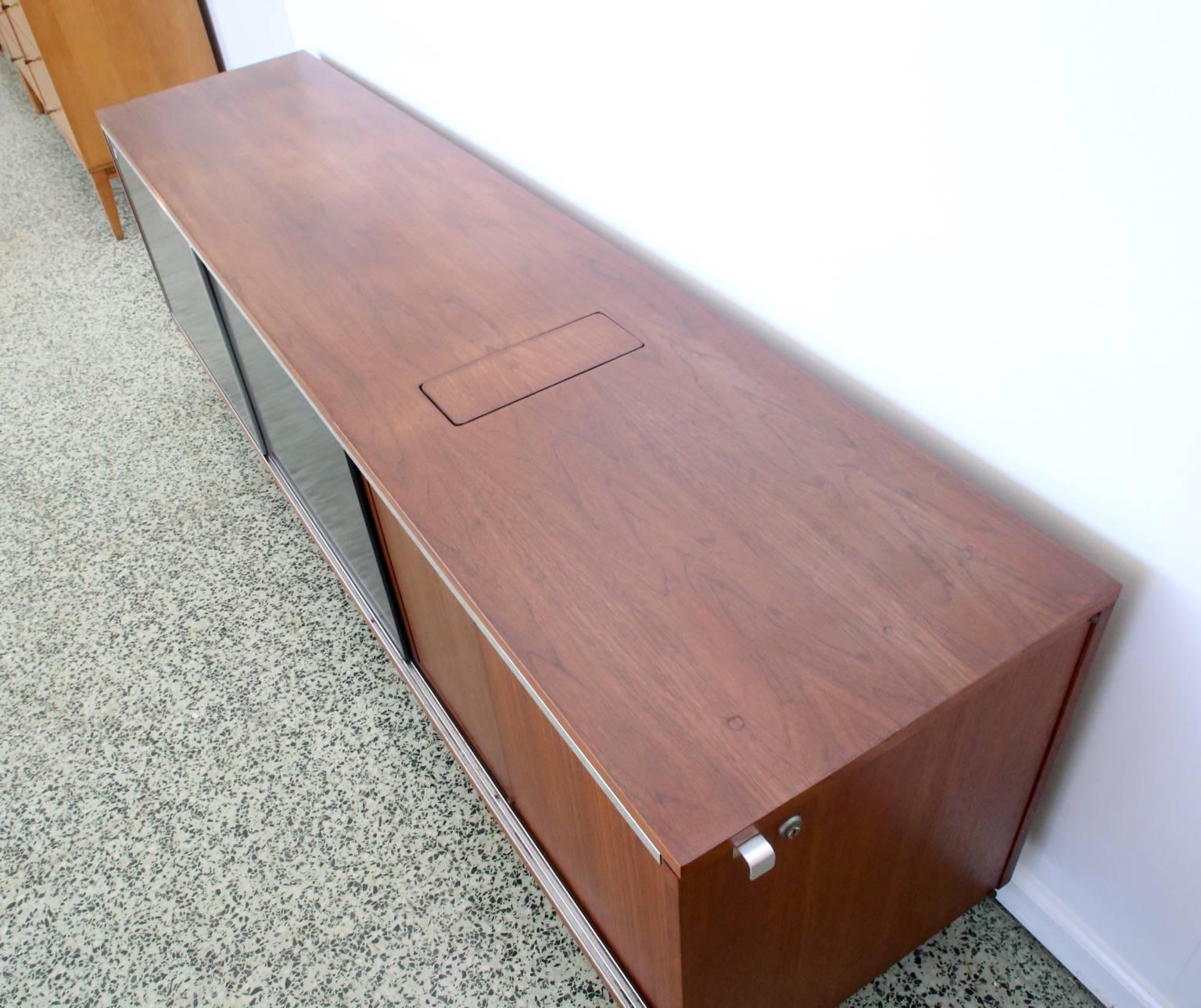 George Nelson for Herman Miller credenza with newly finished top. Top has small trash bin compartment. Overall very nice vintage condition. 