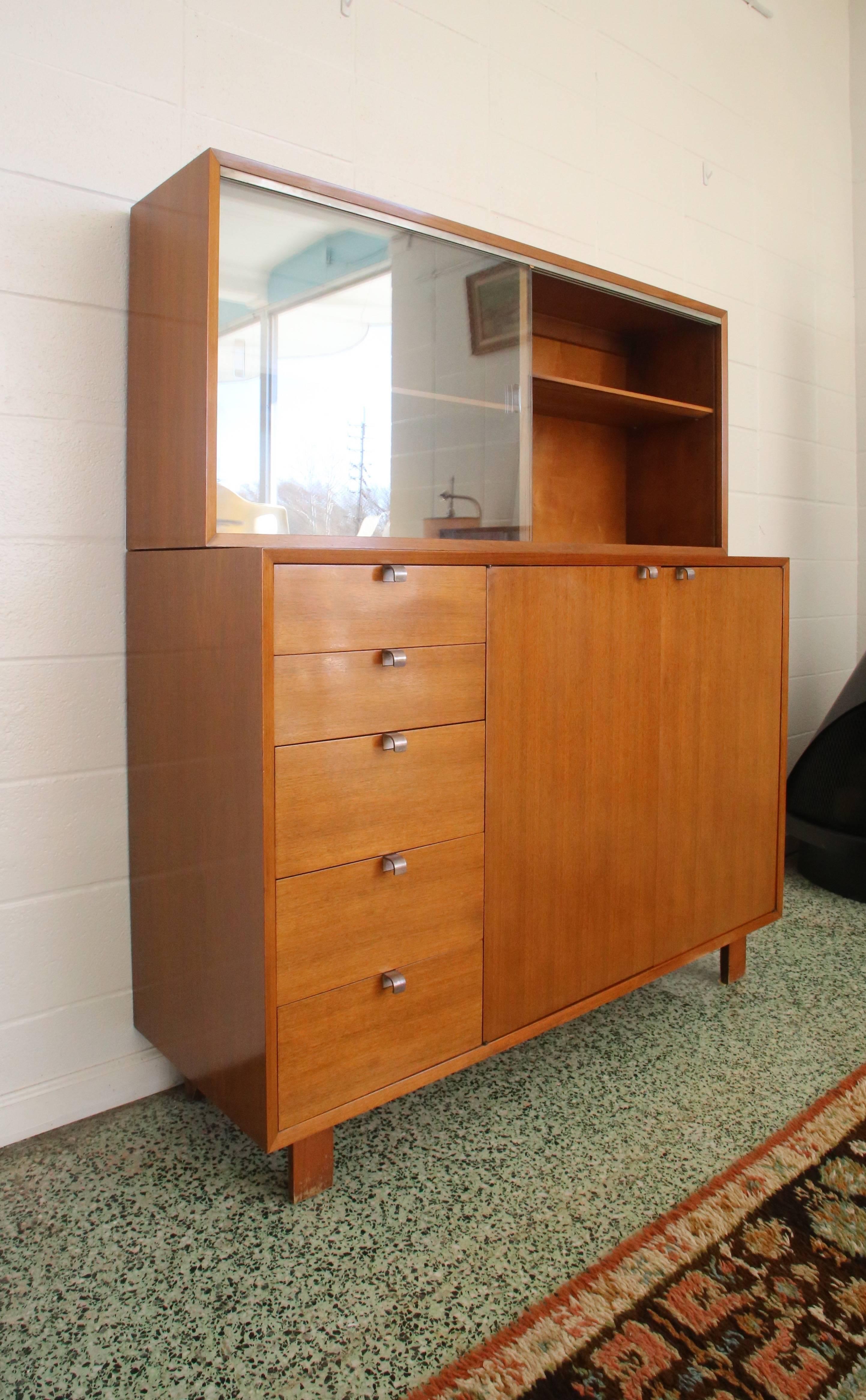 Fantastic tall credenza with five drawer and four inner drawers as well. Super nice shape with hutch included too. You certainly don't need to use that if you don't want to, or the hutch top could be attached to a wall. However you want to set it