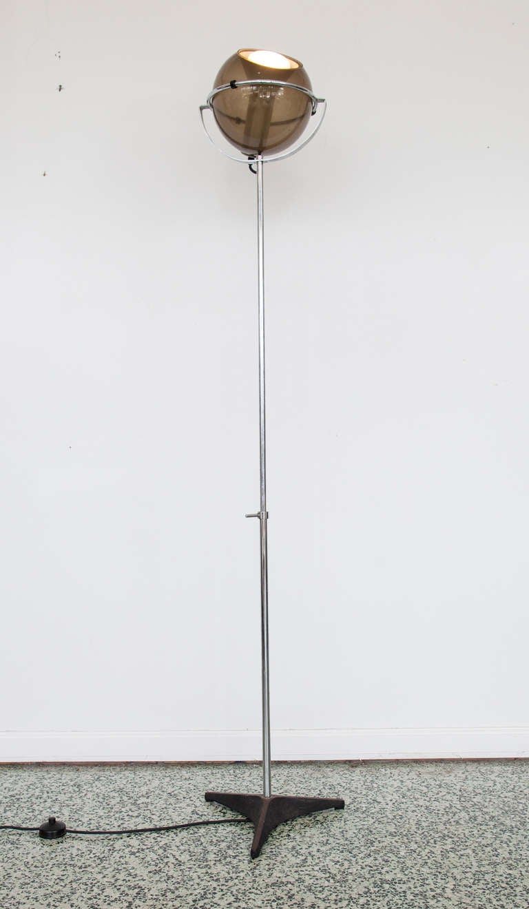 Unique midcentury floor lamp with glass eyeball shade on chrome and metal base, working order. Original finish.