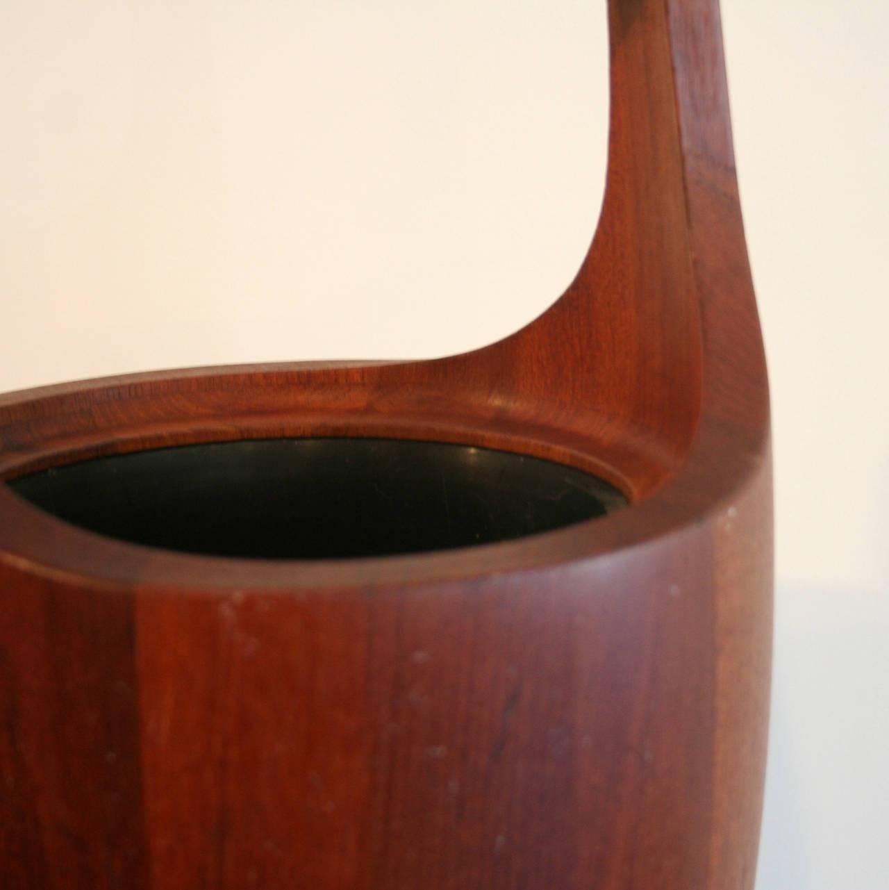 **ICE BUCKET JUST REDUCED FROM $415**

This unique vintage ice bucket, which is crafted from solid teak, easily doubles as vase for your favourite plants or flowers. Made in Denmark.