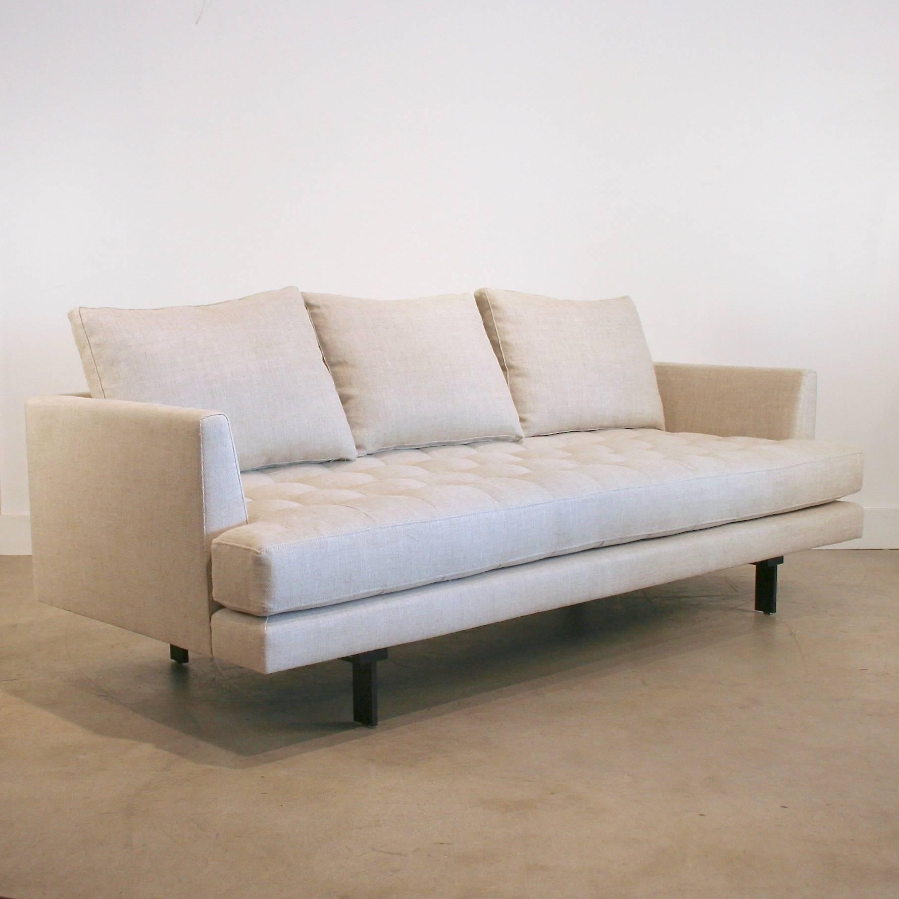 Modern design with square-tufted bench seat cushion, and loose back cushions. Unique black steel legs and a sleek low-profile frame. This model is upholstered in a beautiful natural 100% Belgian linen.
Eco-friendly foam seat and down-wrapped