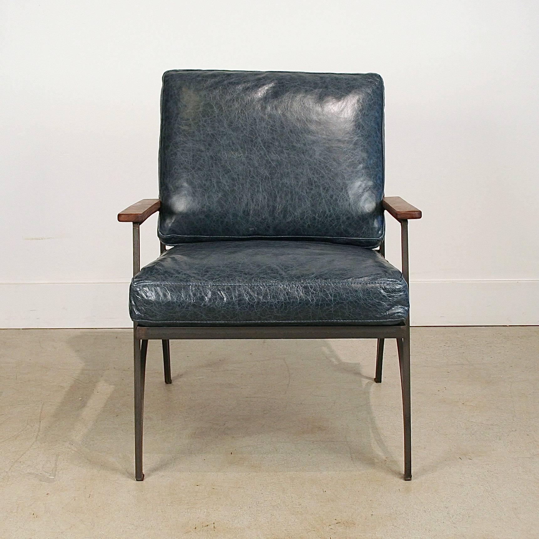 Bronson blue Italian leather cushioned Dean chair sculpted in metal, finished with solid walnut armrests. Made in Los Angeles.