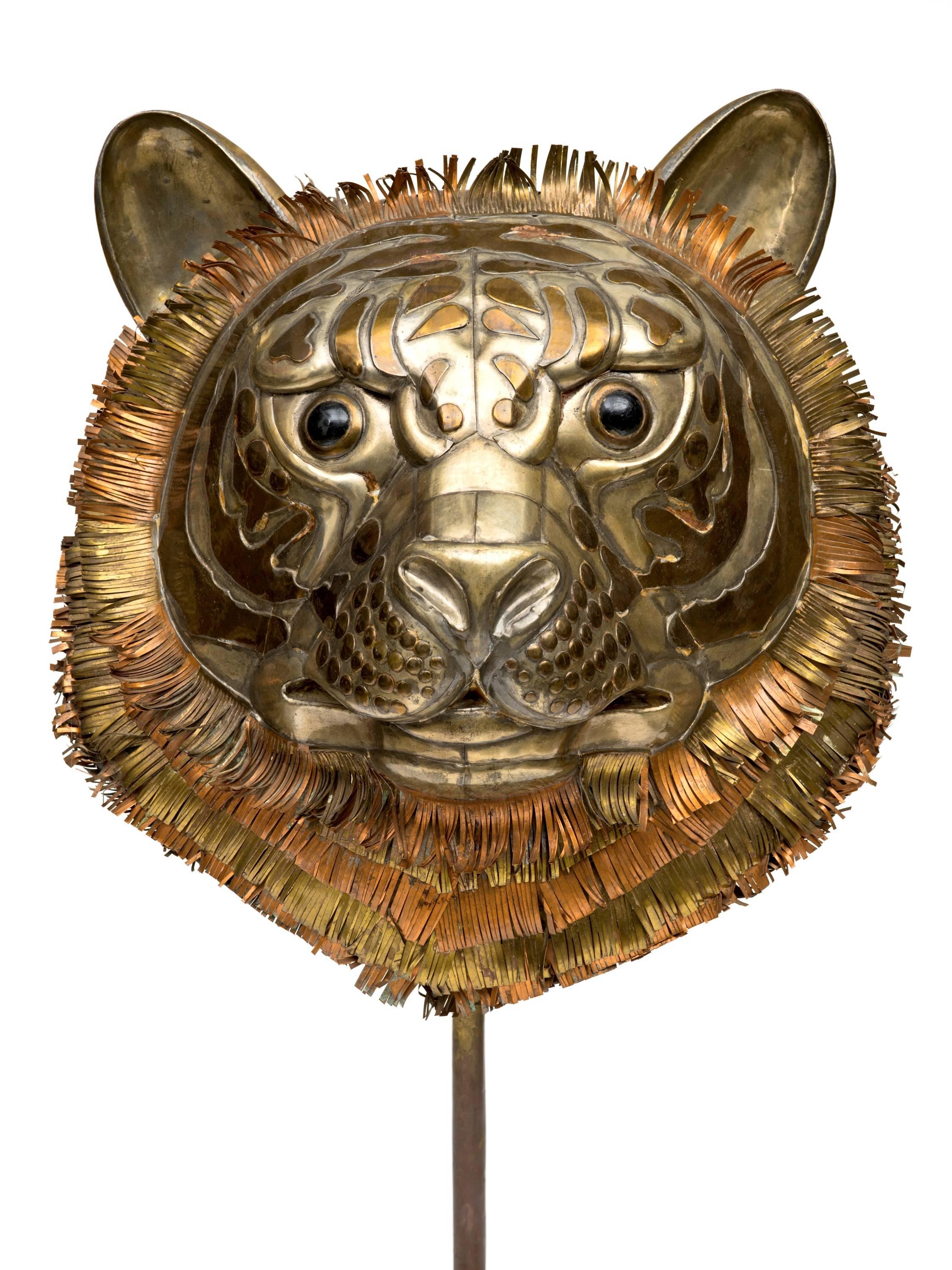 From the 1960s comes this great tiger sculpture by Sergio Bustamante of mixed metals on a copper base. Great scale and design makes this an unusual and dynamic Bustamante find! Signed. 