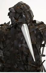 Sculpture figurative en caoutchouc noir à la manière de Chakaia Booker