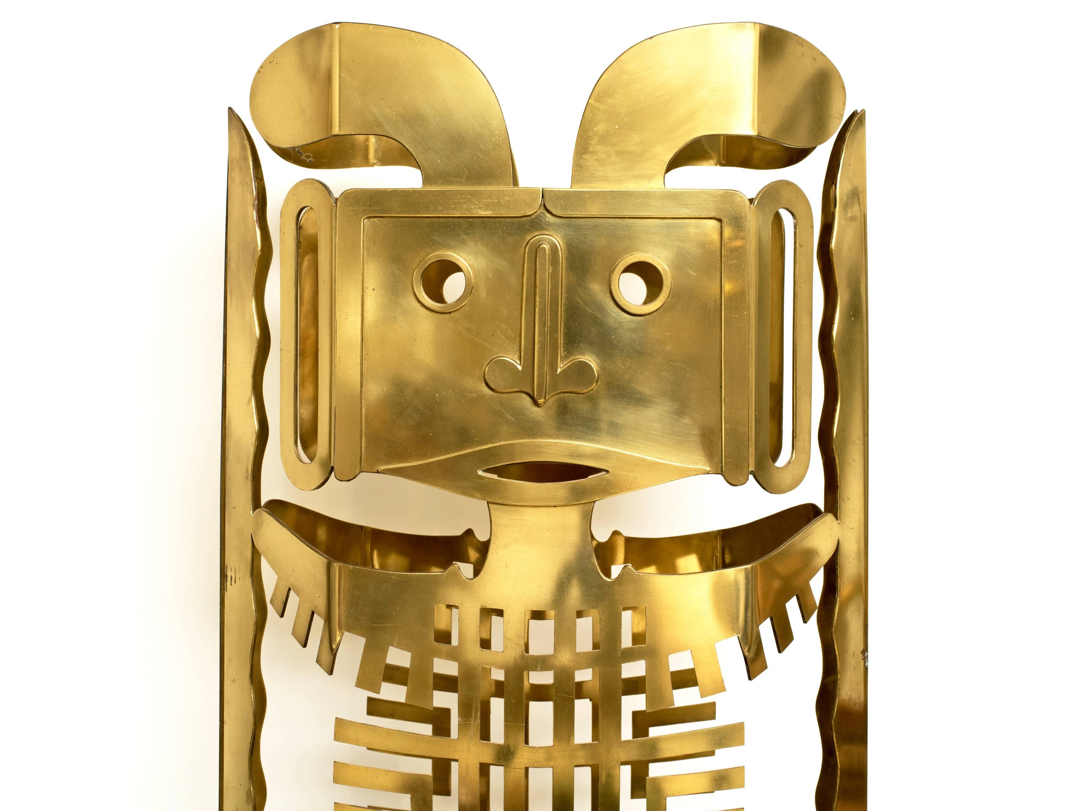 Stunning 6' Mayan totem sculpture in polished brass by renowned sculptor Robert Zeidman (1915-1996). This unique sculpture is double sided with pinned brass hinges and can be used as a screen as well.  When opened it's 42 inches wide.

Zeidman