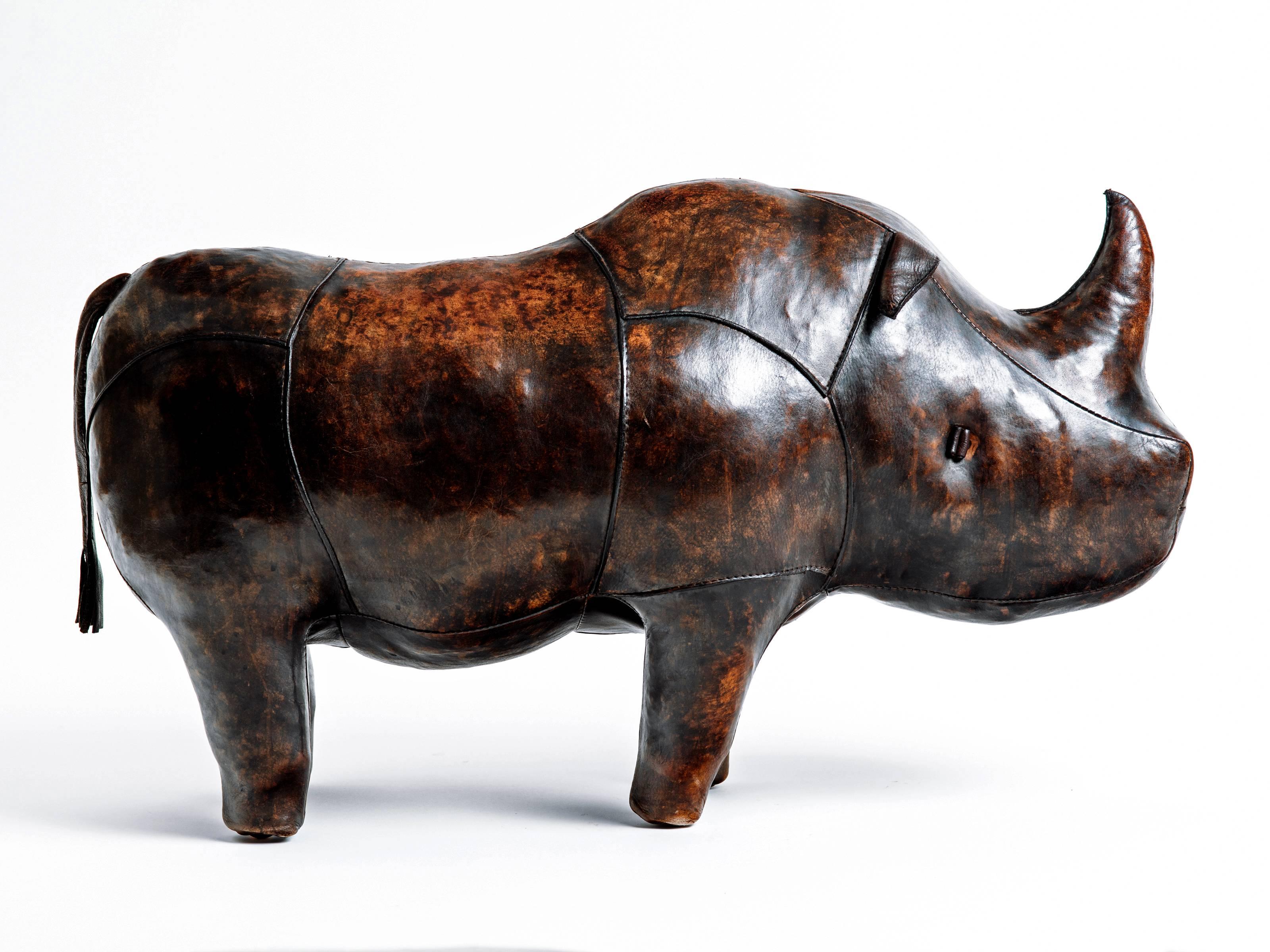 Great vintage Abercrombie and Fitch Leather Rhino footstool.  Since the 1960s, Abercrombie and Fitch commissioned a series of leather rhinos to use as display pieces in their American stores. As collector’s items, this guy has great patina and is