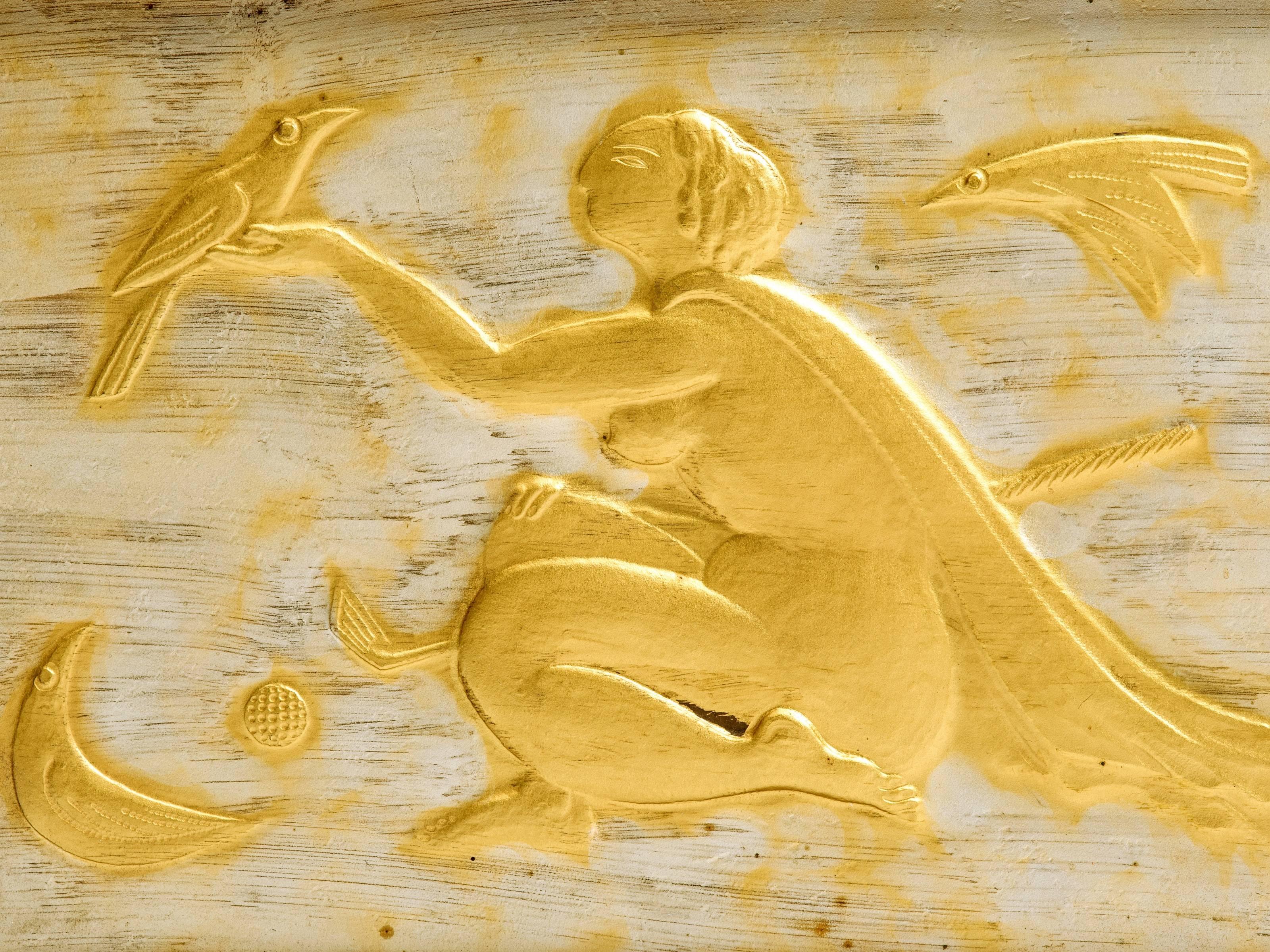 Stunning giltwood hand-carved figural of a nude woman reaching out to birds holding a golf club. Truly one of the most spectacular pieces of golf art in silver and gold gilt. Period mahogany frame with green silk matte, artist signature and Miyamoto