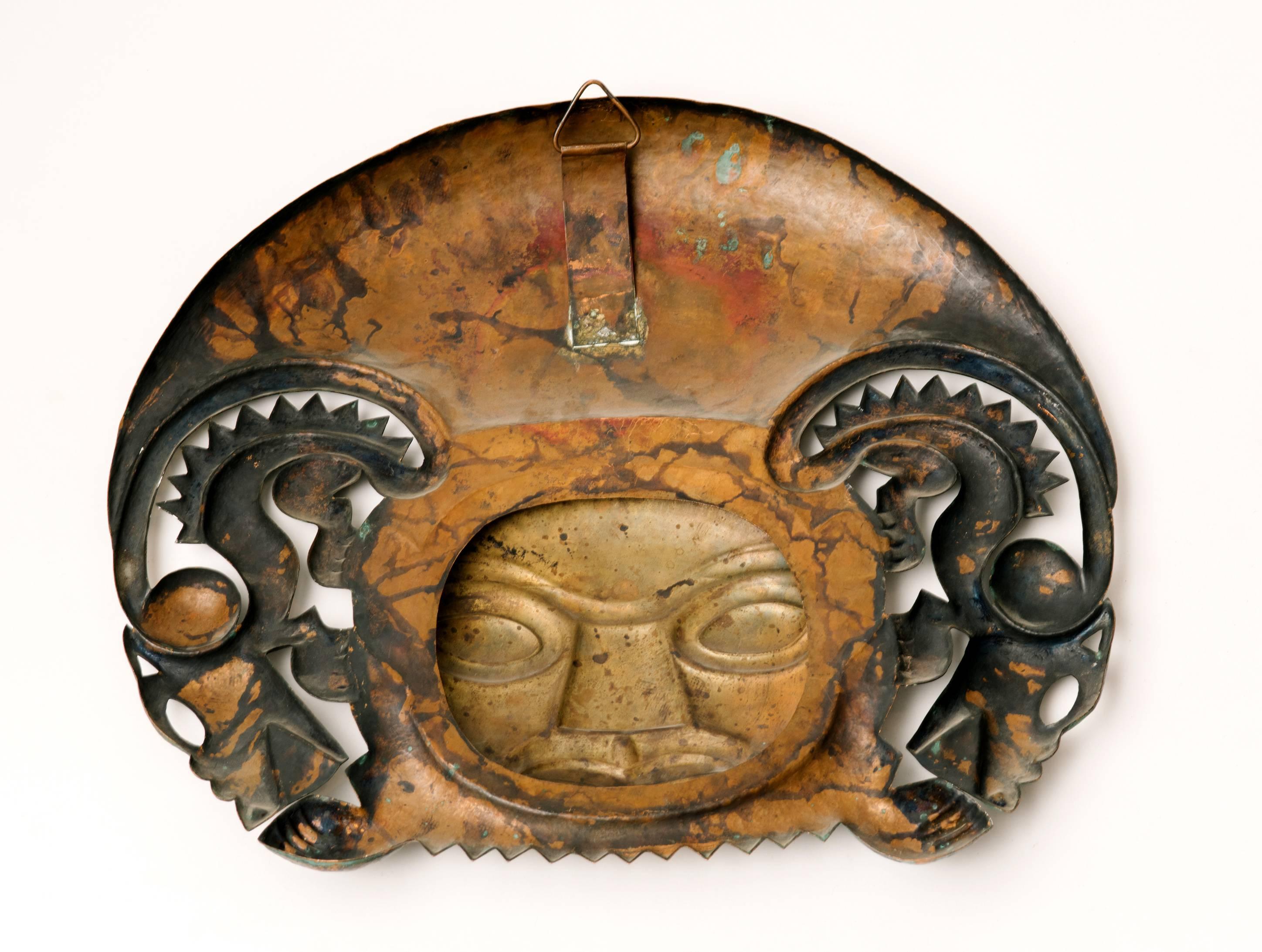 Pair of Peruvian Mask Sculptures Attributed to Graziella Laffi  1