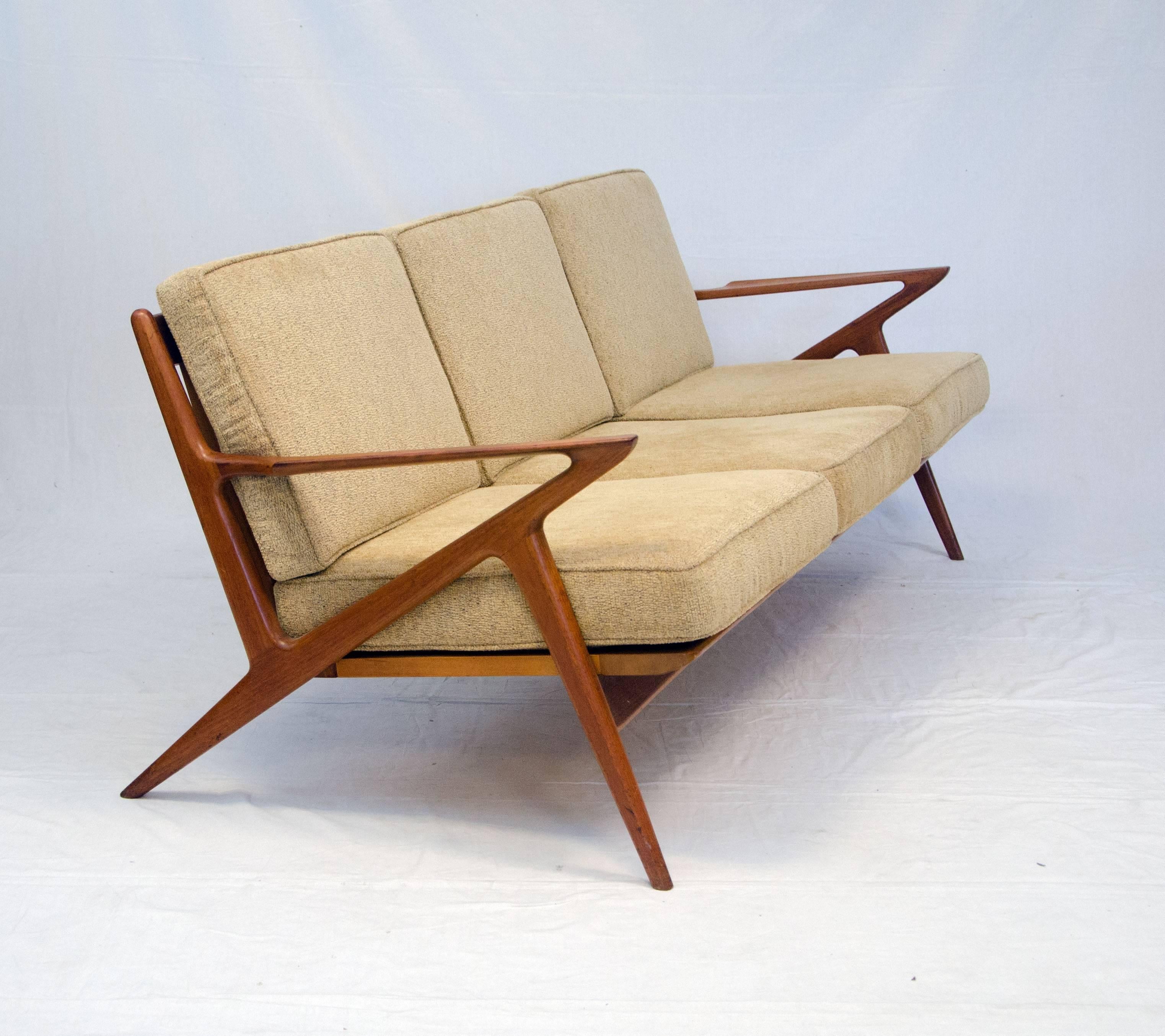 Very nice Mid-Century Danish Modern teak Z sofa manufactured by Selig and designed by Poul Jensen. The strapping that supports the seat cushions is original and in good condition.