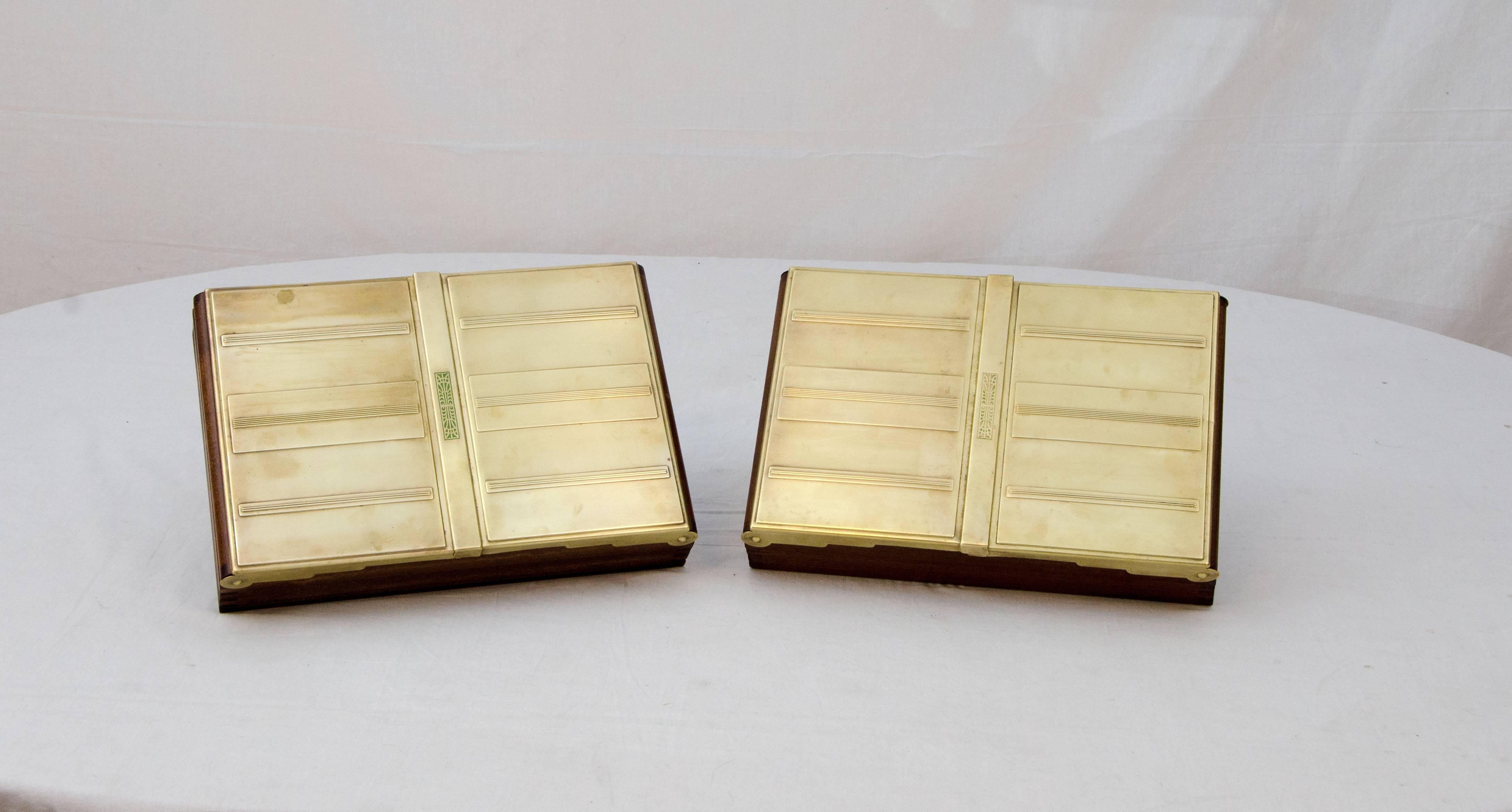 Interesting Art Deco boxes with two part top that lifts up. One half has an Art Deco accent design. Good for jewelry, letter storage or whatnots.