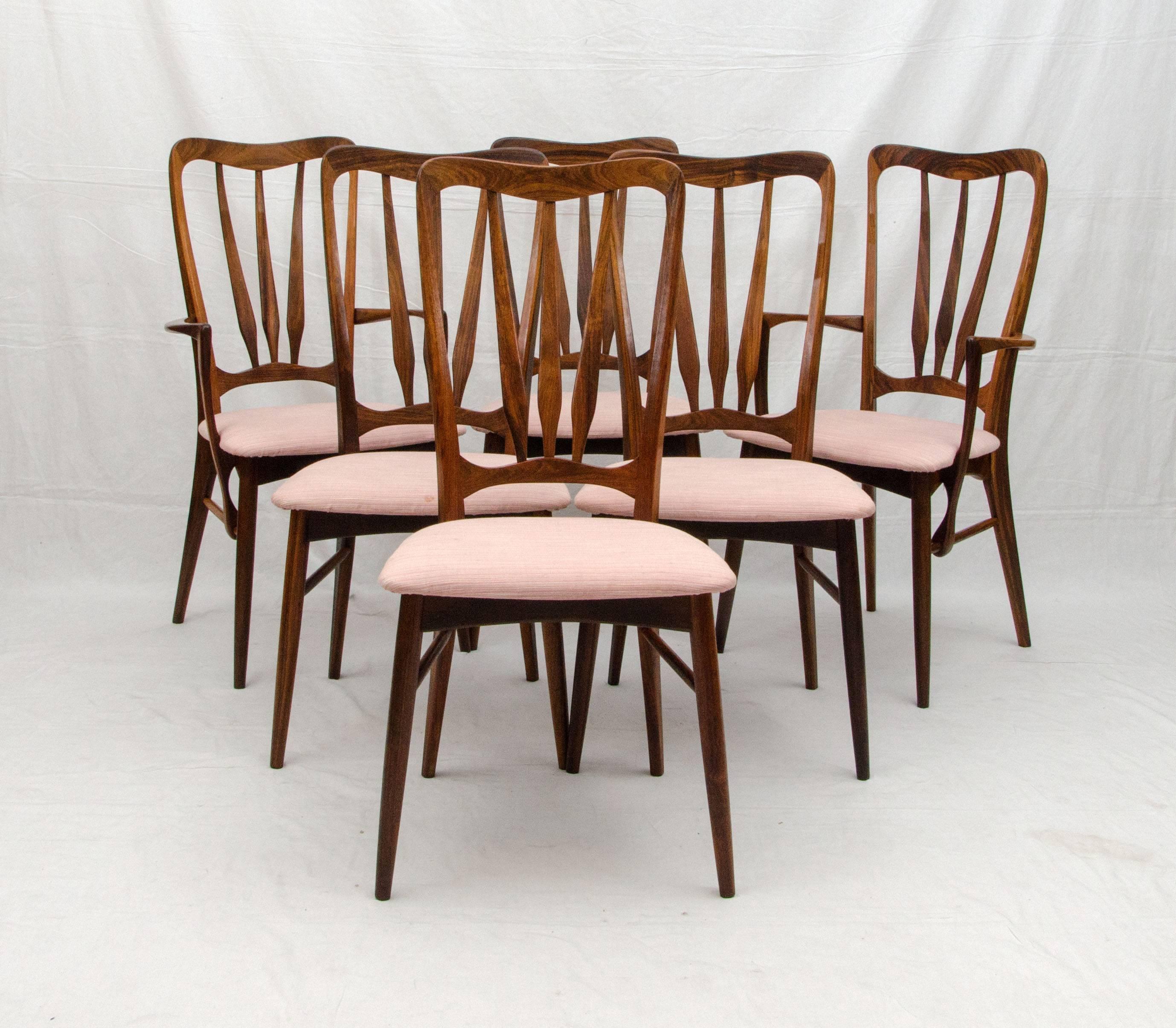 Very nice set of six Danish rosewood dining chairs, two armchairs and four side chairs. Designed by Niels Koefoed for Koefoed Hornslet. Some evidence of Danish Control tags, Koefoeds tags and made in Denmark tags. Curvy design with a taller back and