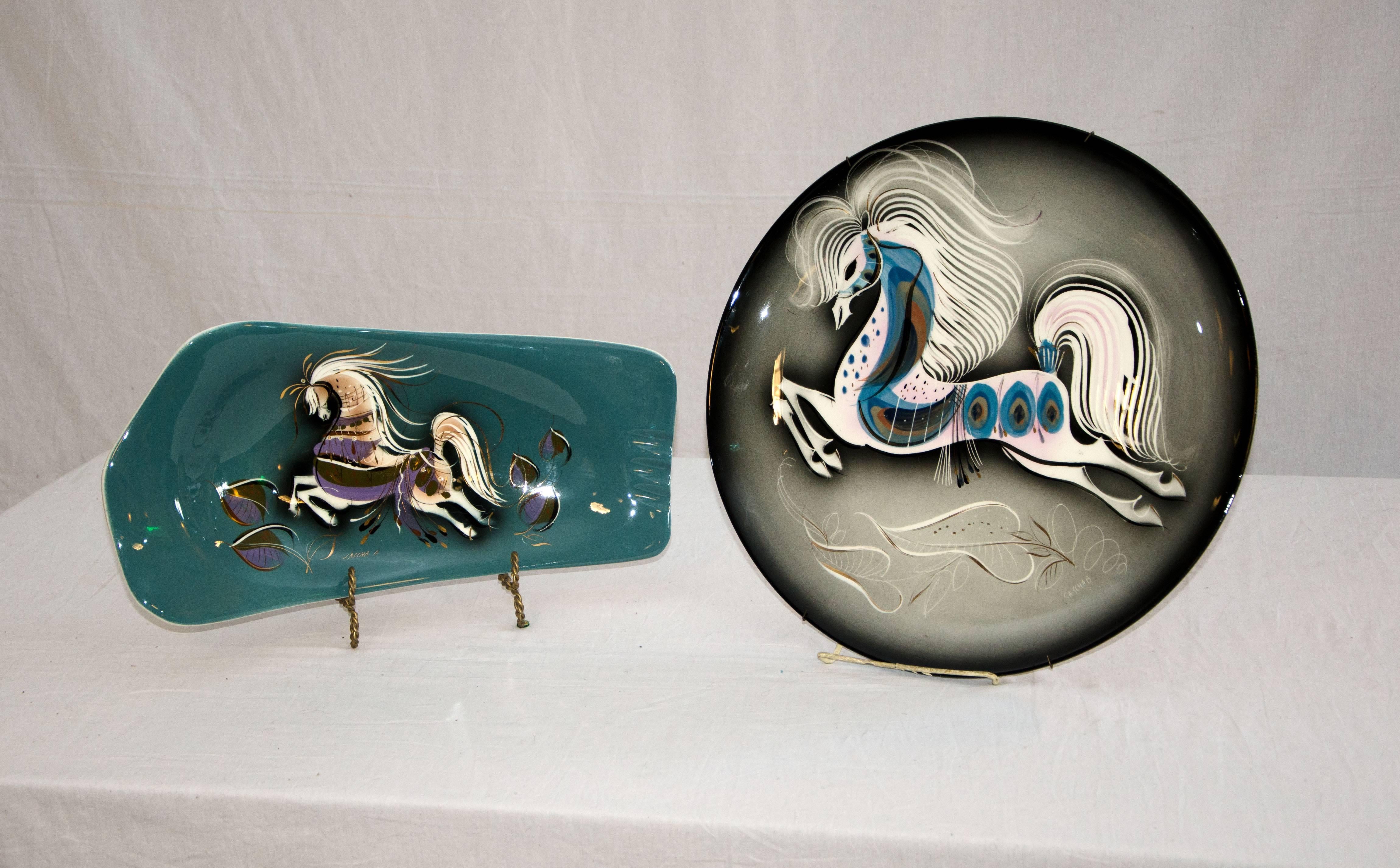Two large Sascha Brastoff items consisting of a cigar ashtray and a wall hanging charger. Since smoking is not fashionable these days the cigar ashtray could be re-purposed as a serving dish for candy or other sweets or whatever is in your