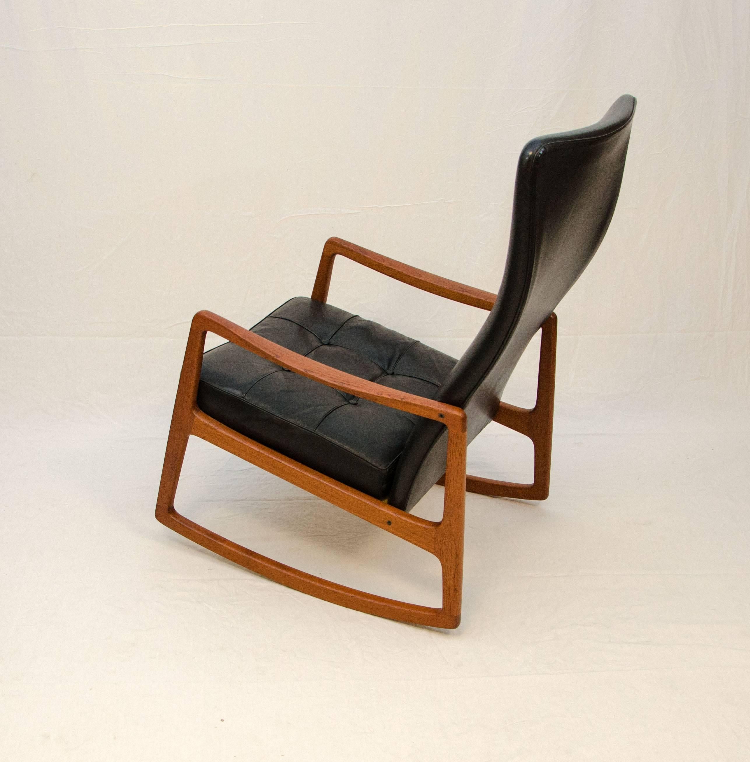 Scandinavian Modern Danish Teak and Leather High Back Rocking Chair by Ole Wanscher For Sale