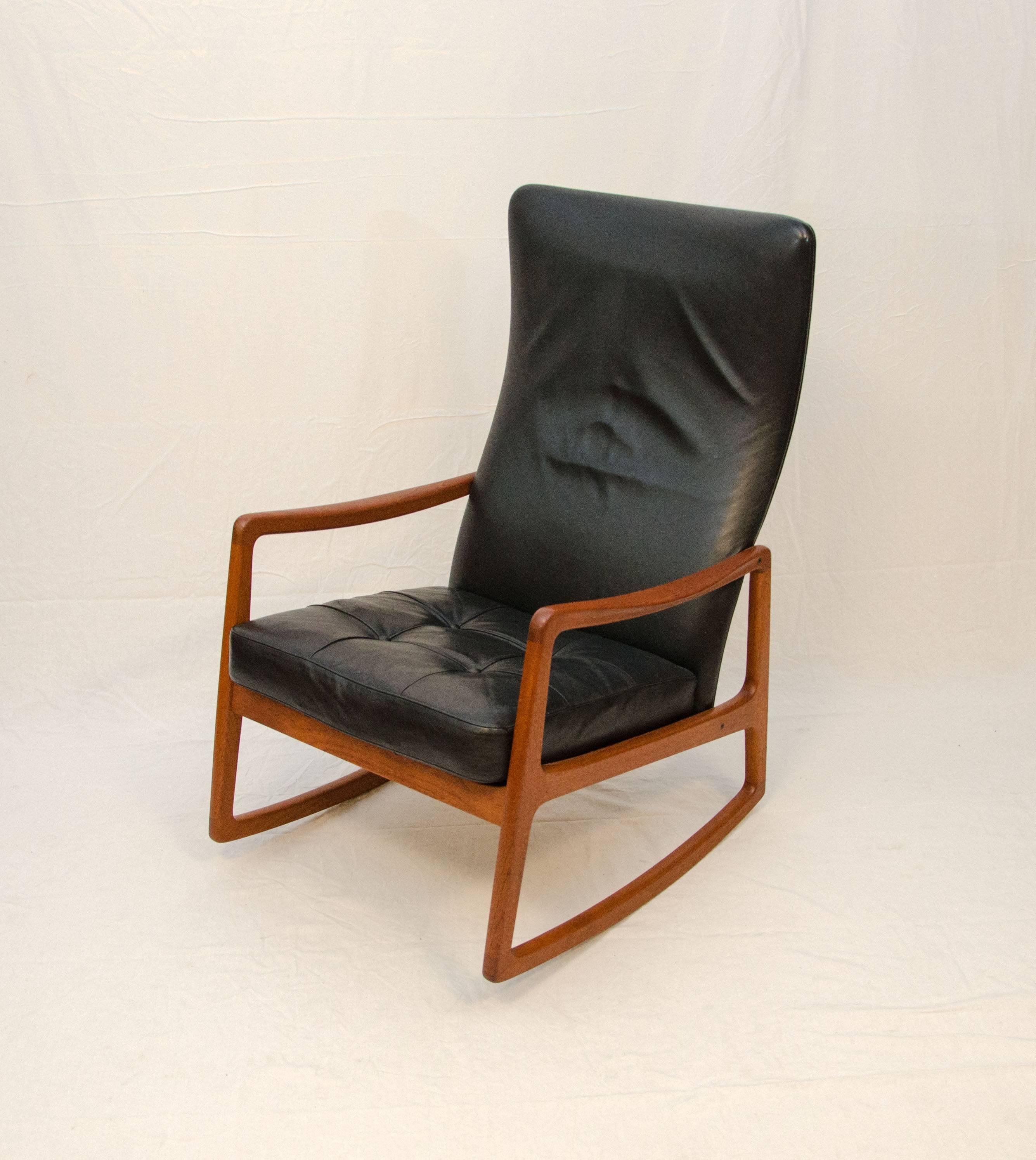 20th Century Danish Teak and Leather High Back Rocking Chair by Ole Wanscher For Sale