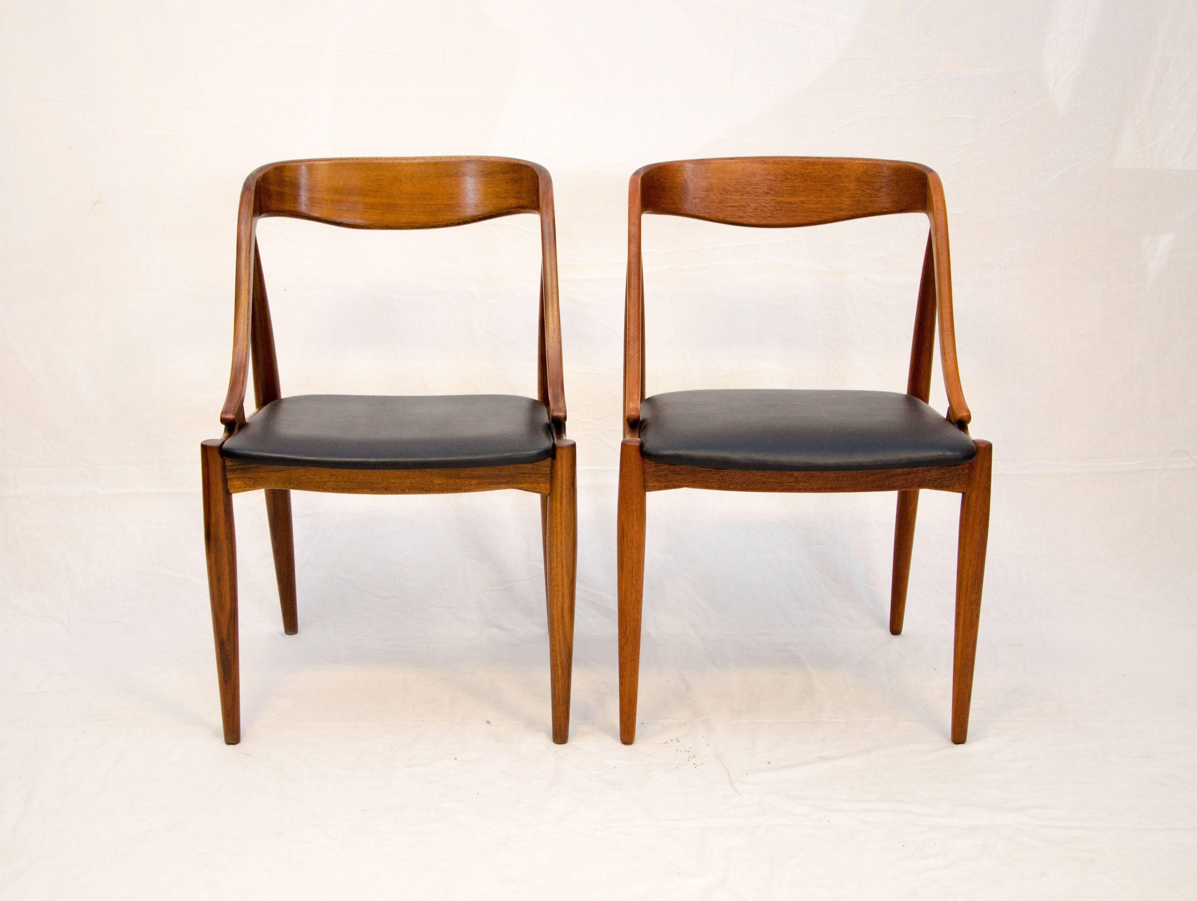 A pair of curved back dining chairs to add to your set. Perfect for a small breakfast table, as accent chairs in a bedroom, or even as desk chairs.
