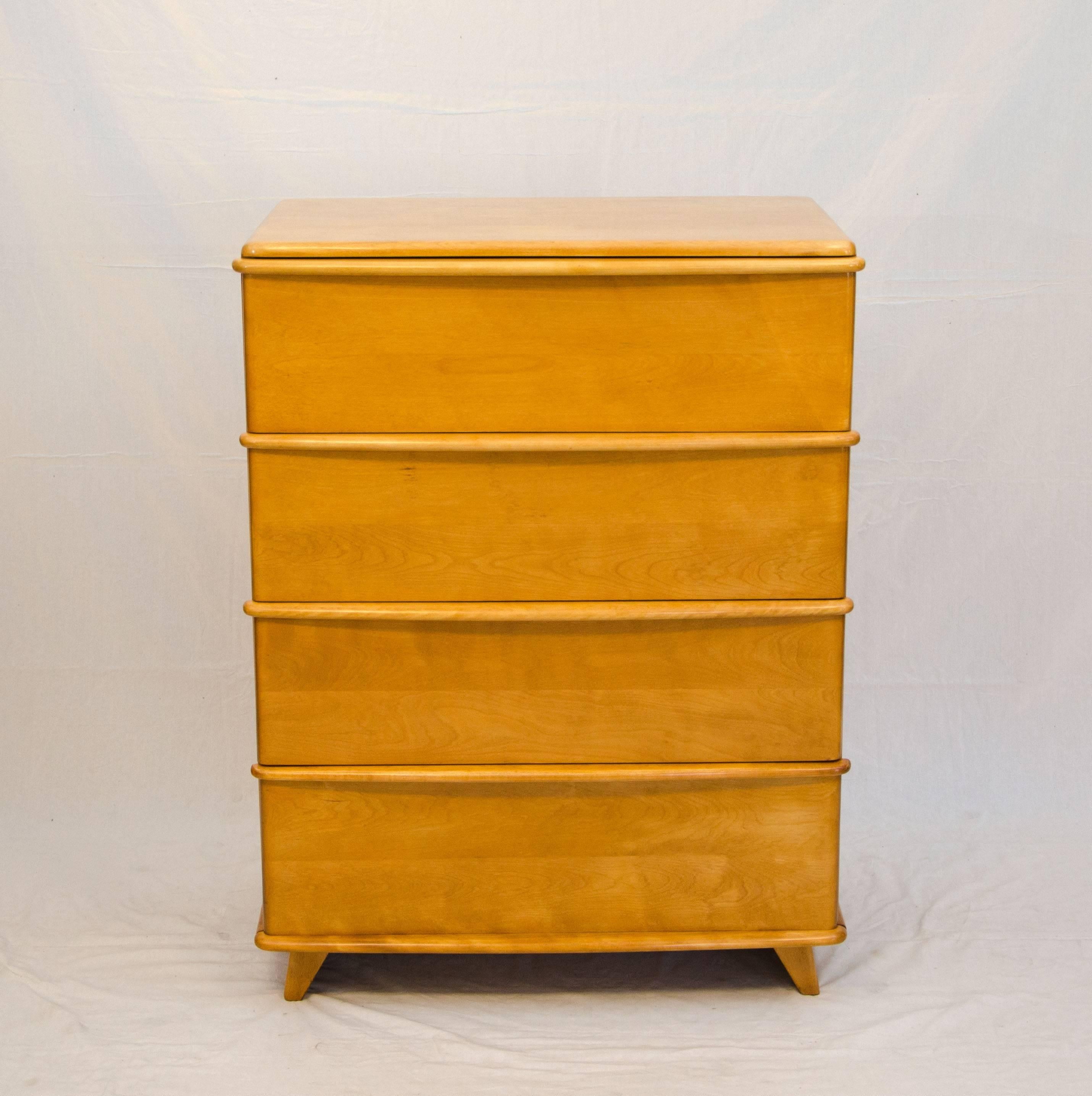 Very nice highboy chest with four deep drawers, each drawer interior is 8" deep. Drawer pulls are attached at the top of each drawer and are tapered from 1" at the ends to 2" at the center. Drawers open easily and smoothly. This chest