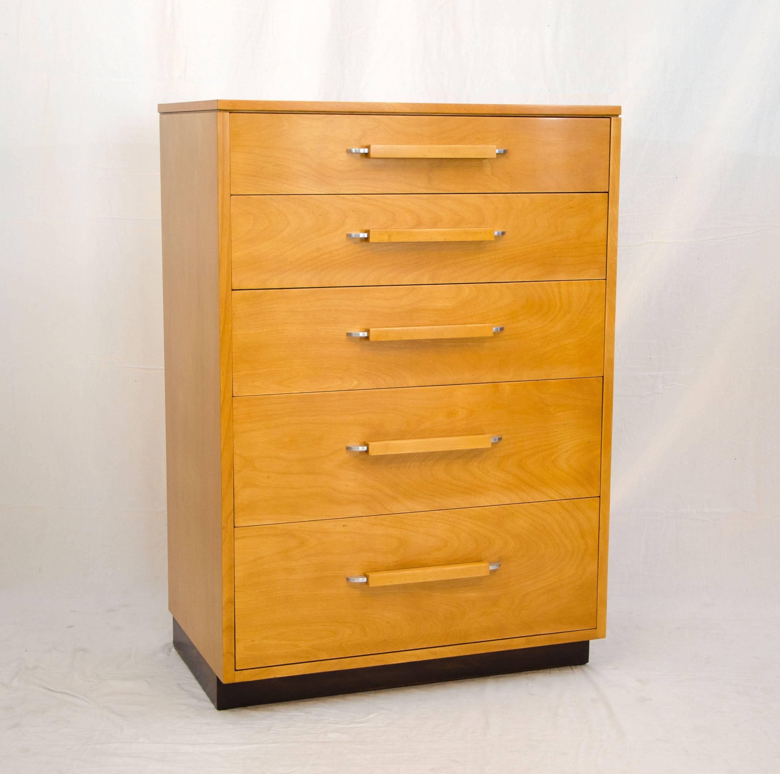 Beautiful five drawer highboy chest of drawers. Designed as part of a modular system known as the 