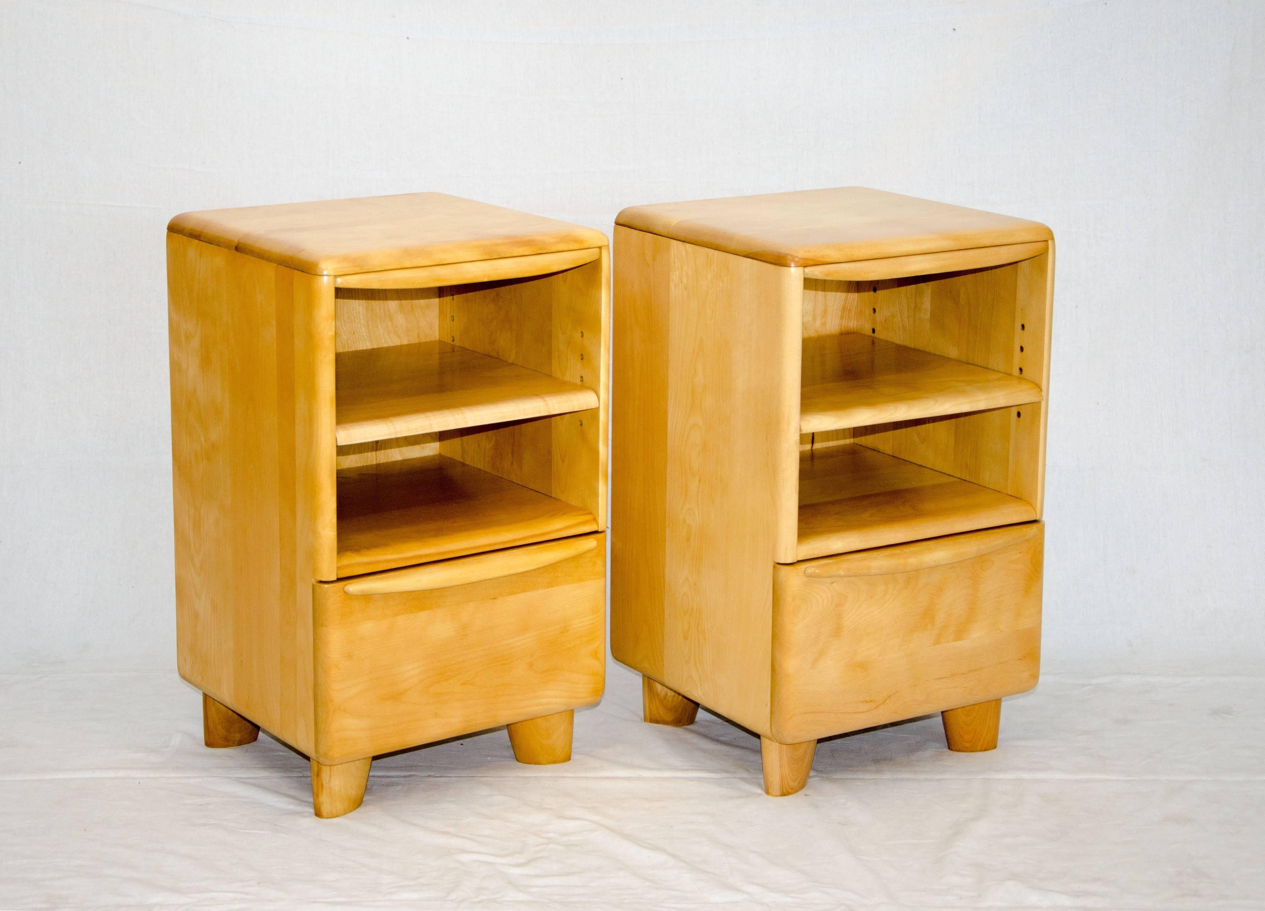 Pair of Heywood Wakefield nightstands from the "Encore" series (M 518) manufactured from 1948-1955.The open space has an adjustable or removable shelf, the space measures 13 1/4" wide by 13" deep and 12" tall. The drawer