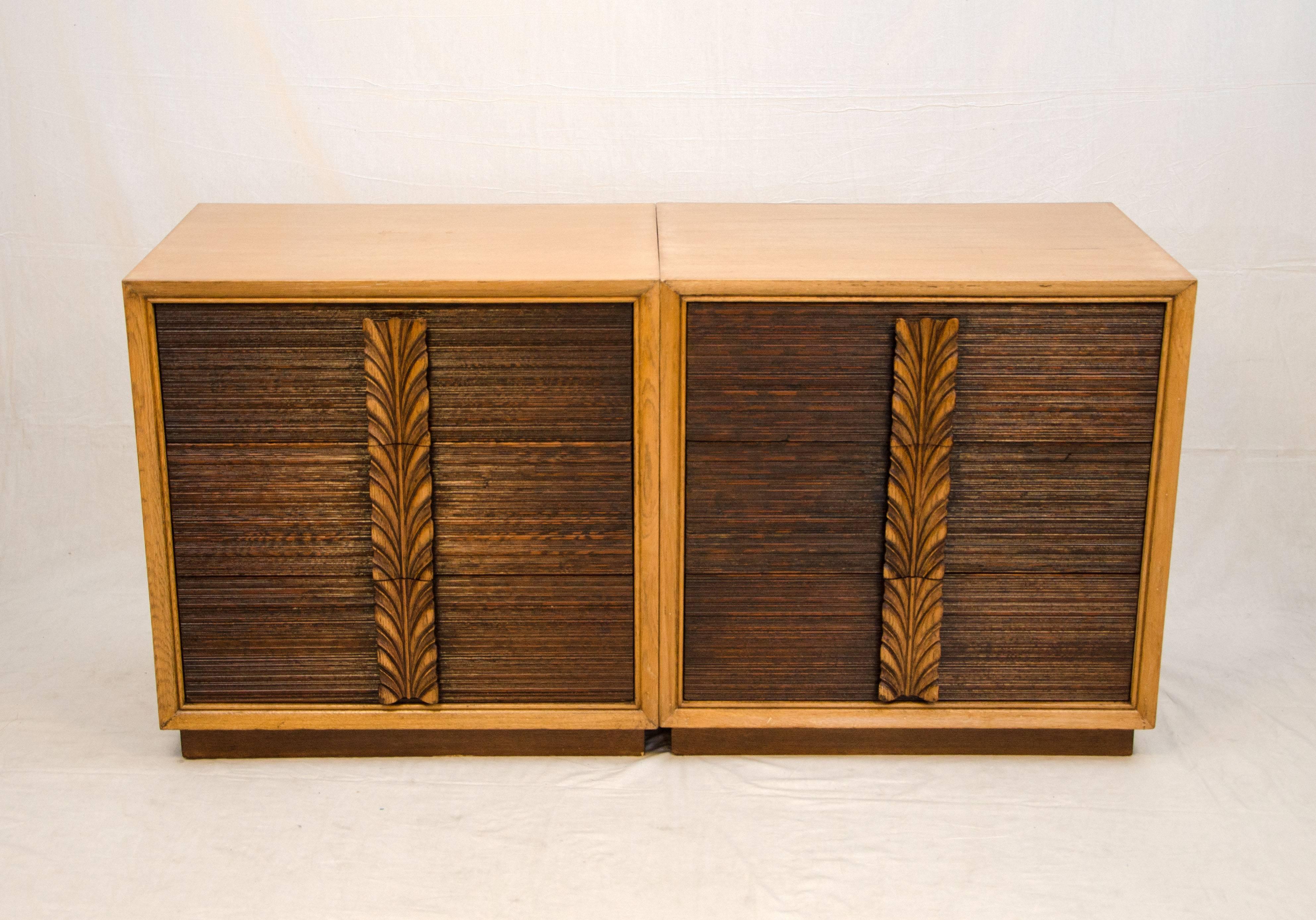 Nice pair of small dressers that can be used separately or placed close together. These have a style similar to Paul Frankl designed furniture from the, 1940s-1950s. The blond oak cases are accented by the darker combed wood drawer fronts and