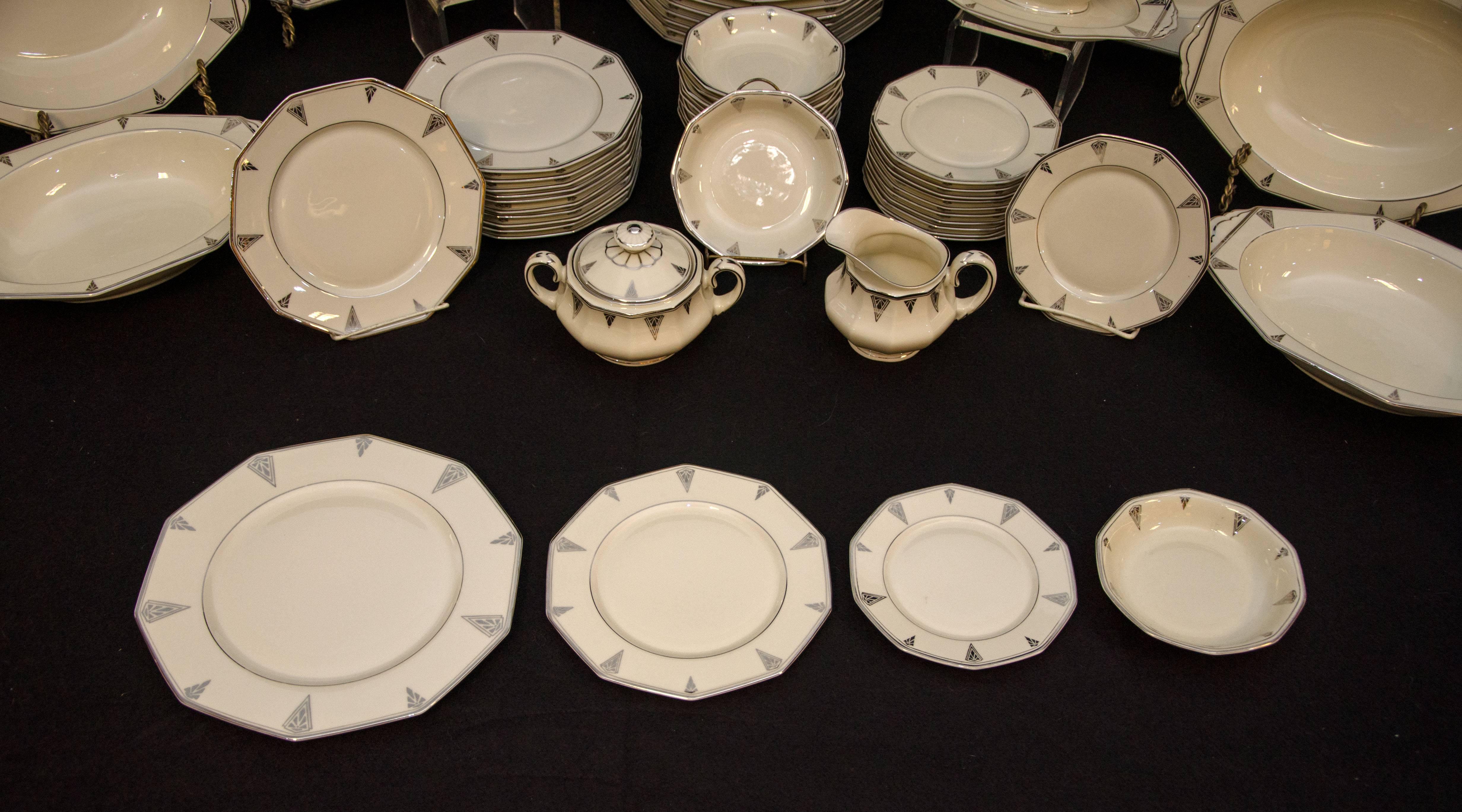Hard to find large set of Art Deco Bavarian Community china in the Deauville pattern, a cream color with a silver accent pattern. The previous owner initially received part of this set as a wedding gift and added other pieces to the collection for a