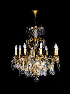 Lustre à douze lumières en cristal doré de Louis XV