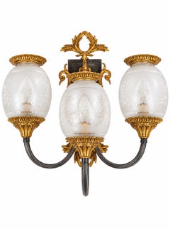 Pair of 20th Century Empire Style Bronze and Gilt Metal Three-Light Wall Sconces