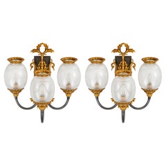 Pair of 20th Century Empire Style Bronze and Gilt Metal Three-Light Wall Sconces