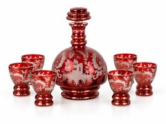 20th Century Bohemian Ruby Red Cut Crystal Decanter and Six Glasses Set