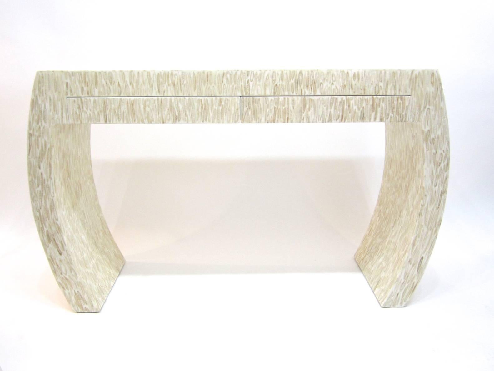 Fantastic console table and writing table made of sliced antler applied on wood and clear coat lacquered. Two side by side drawers finished inside in white lacquer. Mint pristine condition, perfect for entrance way and as writing desk.