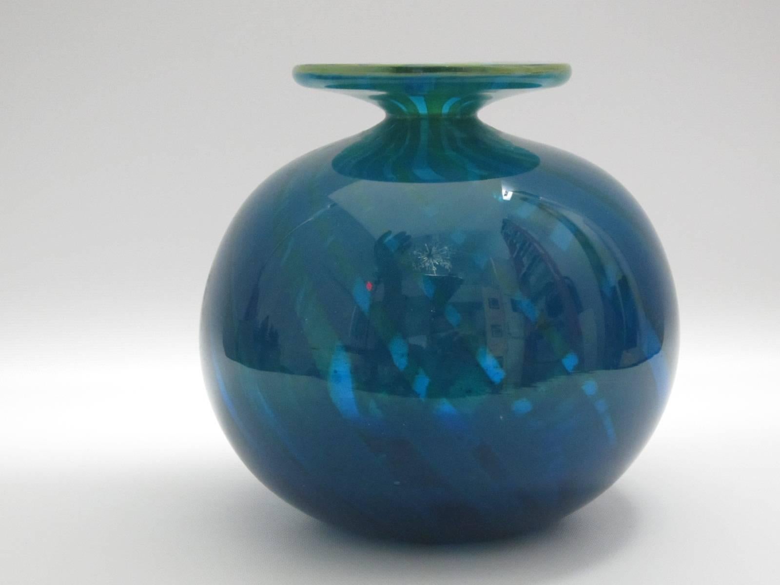 Signed and dated, handblown art glass vase in shades of sea blues and greens. Very pretty low profile with flat top.
 