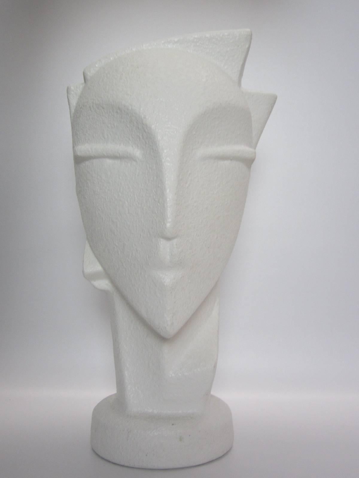 Fabulous vase in textured white ceramic in abstract androgynous form. Inspired by Hagenauer.