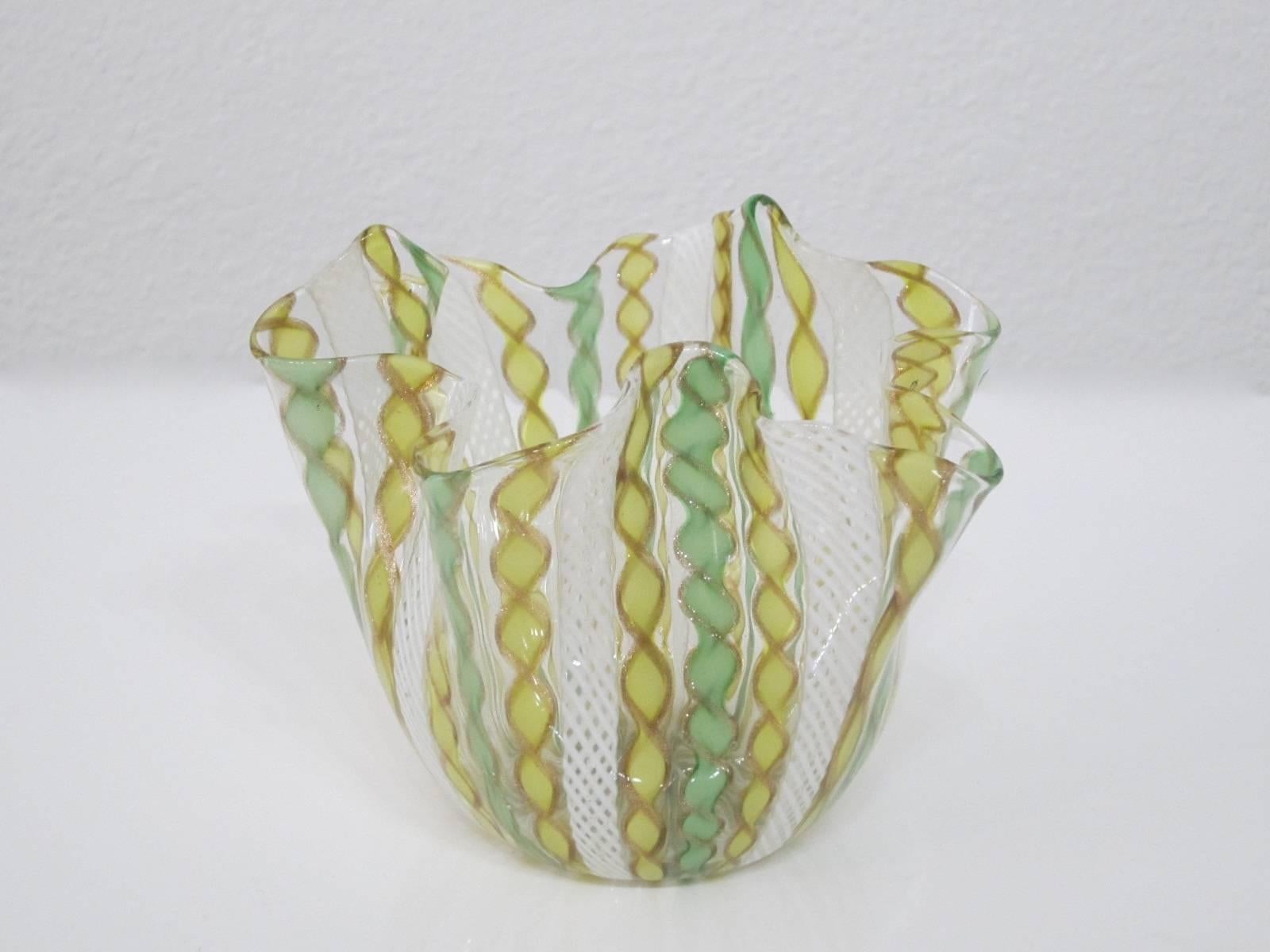 Beautiful handblown Murano glass handkerchief vase in green, yellow, copper, and white. Fantastic and refreshing in color and shape. Great with a low bunch of flowers and as display by itself.