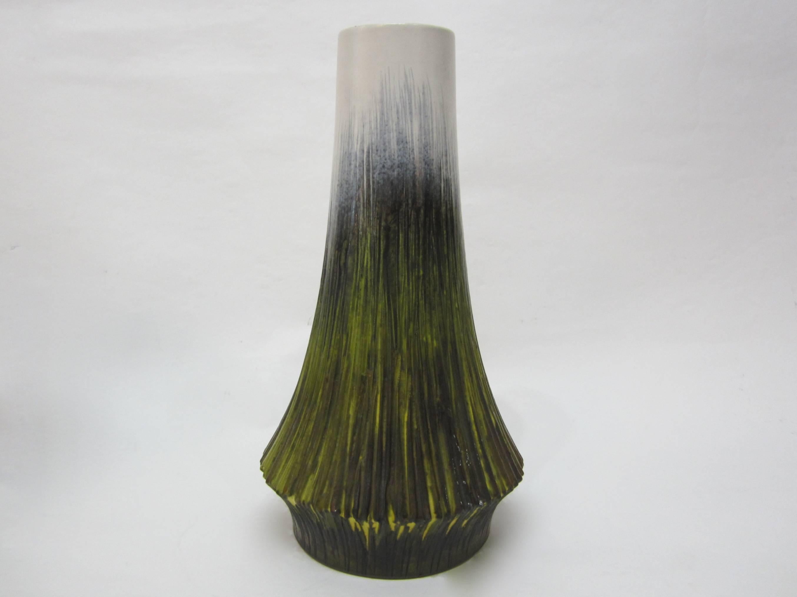 Beautiful ceramic Fantoni vase with a grass-like design in greens and very pale yellow's imported from Italy by Raymor. Signed.